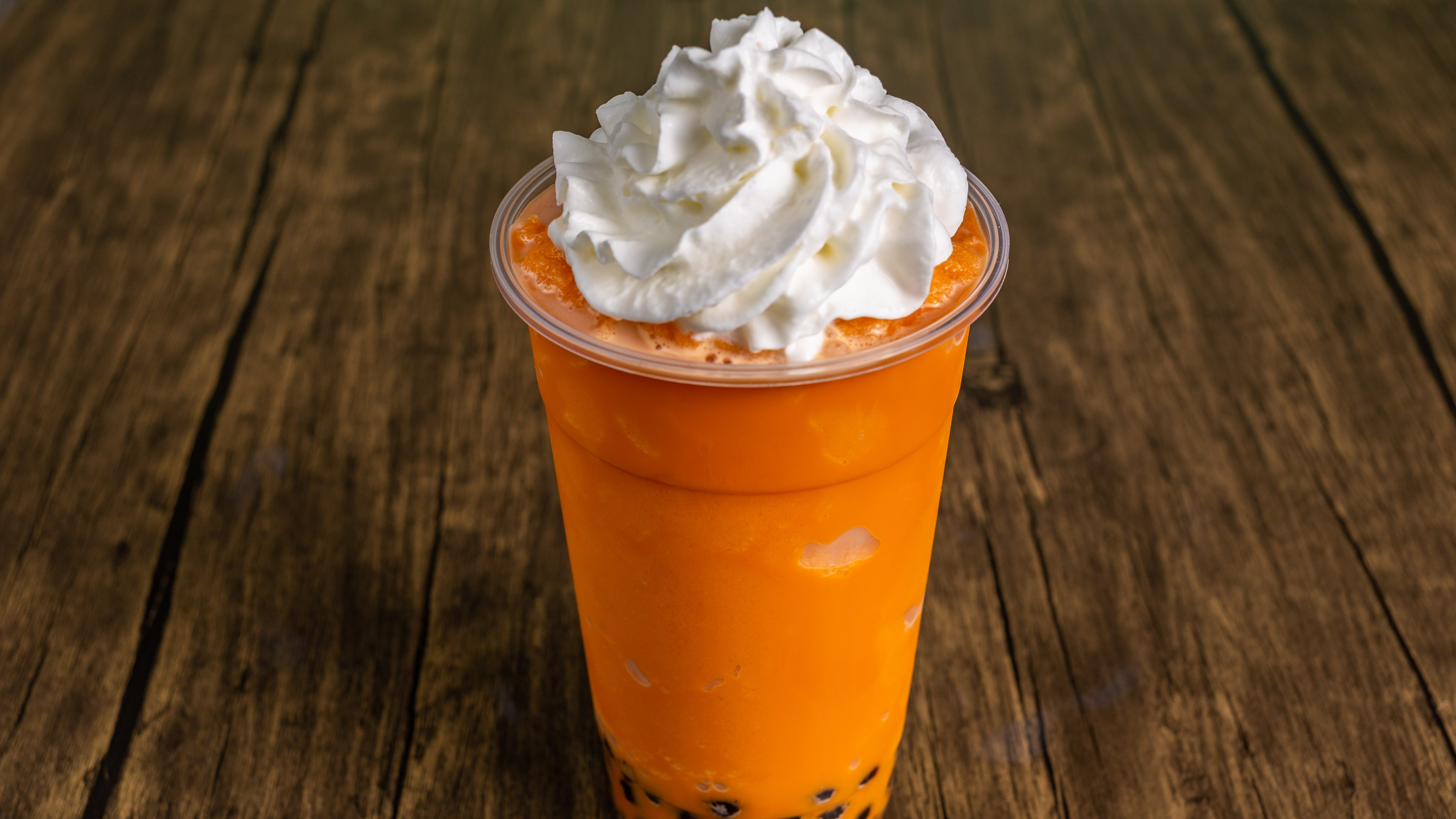 Order Thai Tea Iced Blended food online from St Boba N Donuts store, Burbank on bringmethat.com