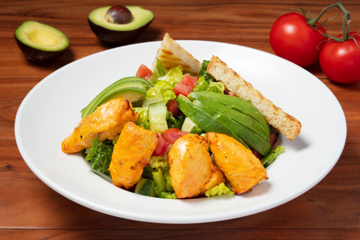 Order Romaine Avocado Salad food online from Panini Kabob Grill store, Woodland Hills on bringmethat.com