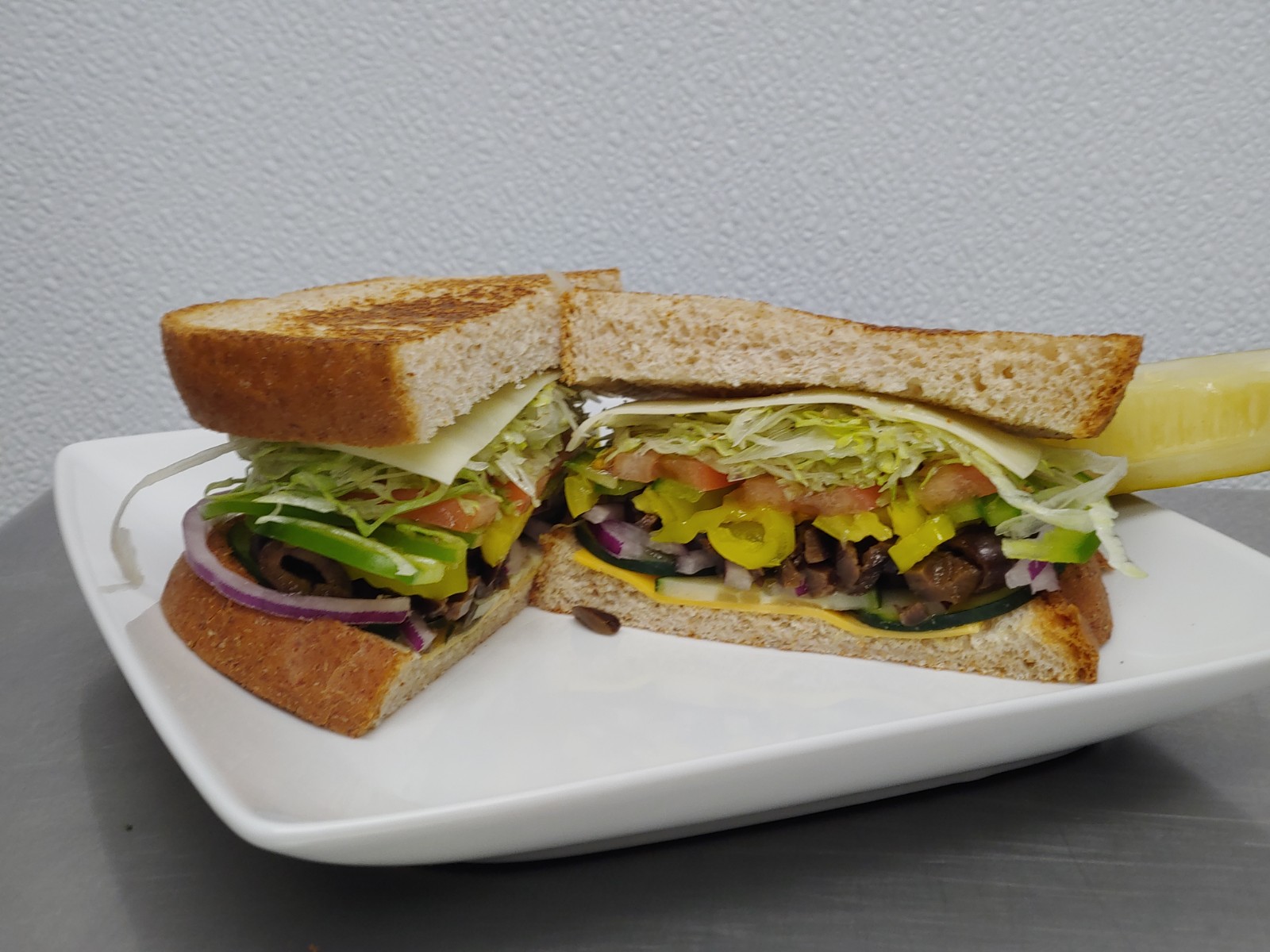 Order 25. The Veggie Sandwich food online from Amazing Deli store, Midland on bringmethat.com