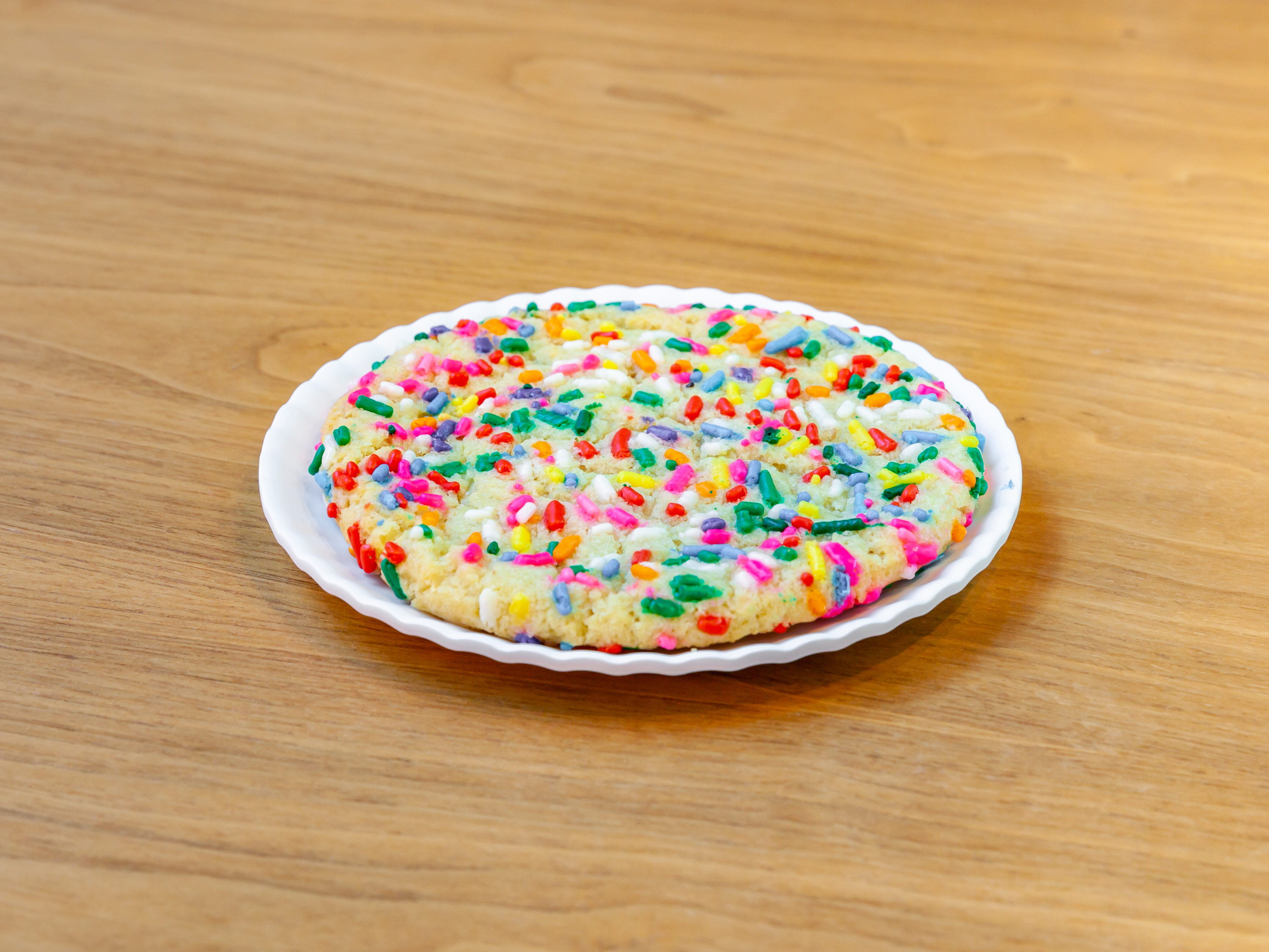 Order Sugar Sprinkle Cookie food online from Molly Cupcakes store, Orland Park on bringmethat.com
