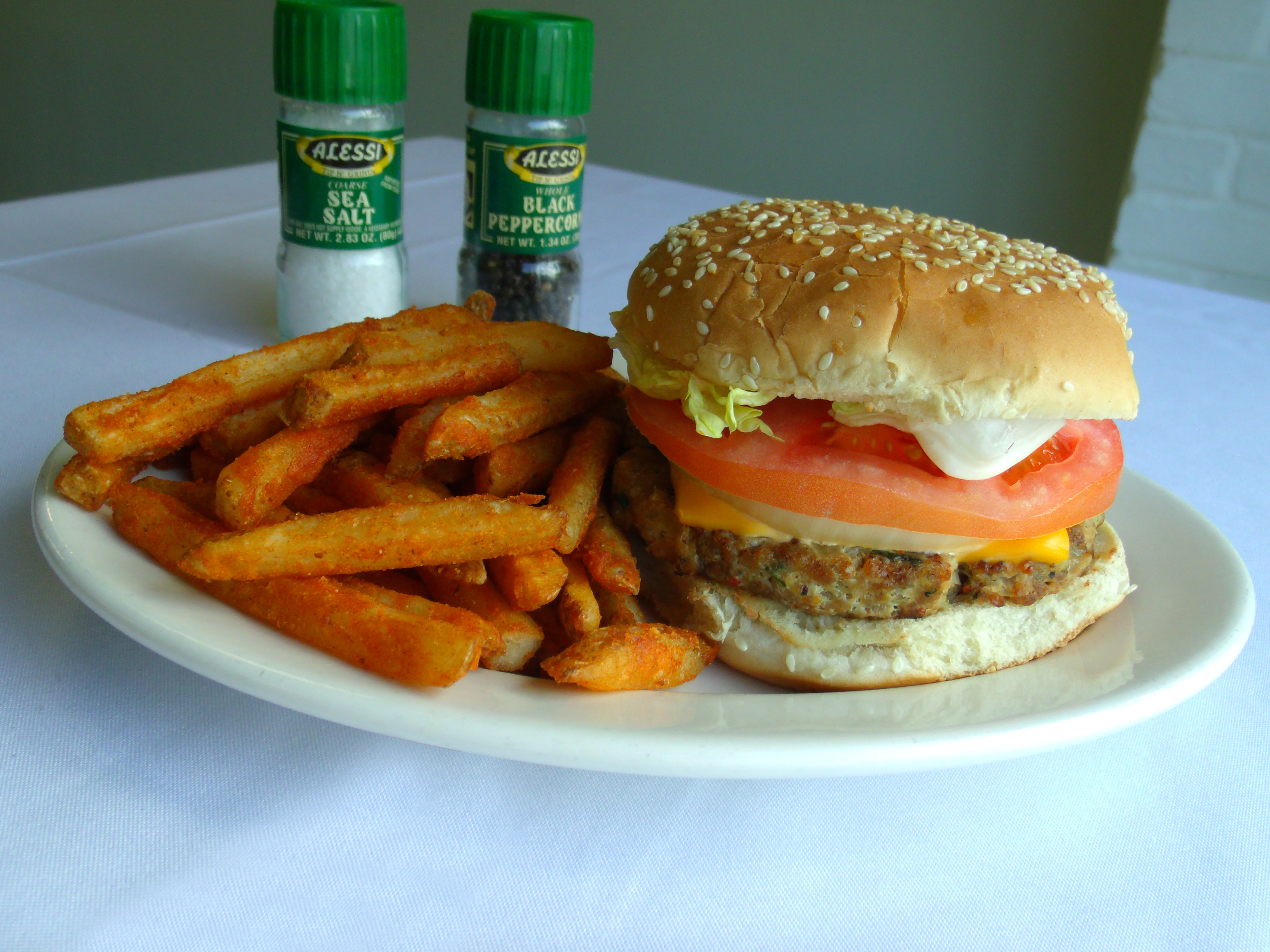 Order 40. Chicken Burger food online from NOLA Desi Kitchen store, Kenner on bringmethat.com