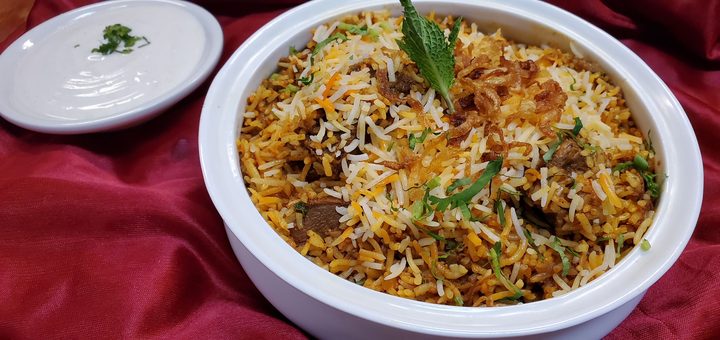 Order Lamb Biryani food online from Spice Route store, Parsippany on bringmethat.com