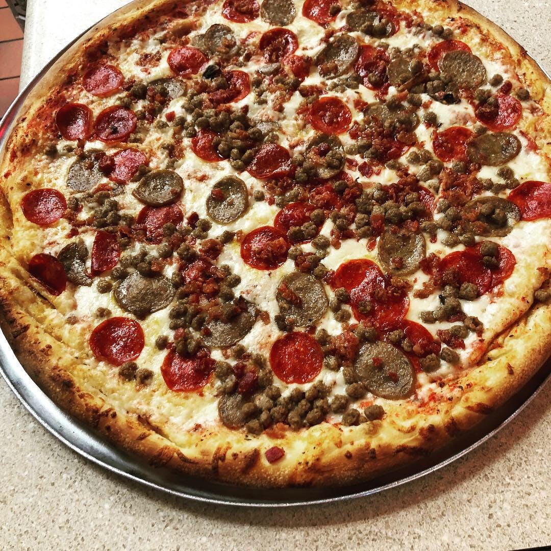 Order Meat Lovers Pizza - Medium 14'' food online from North Myrtle Beach store, North Myrtle Beach on bringmethat.com