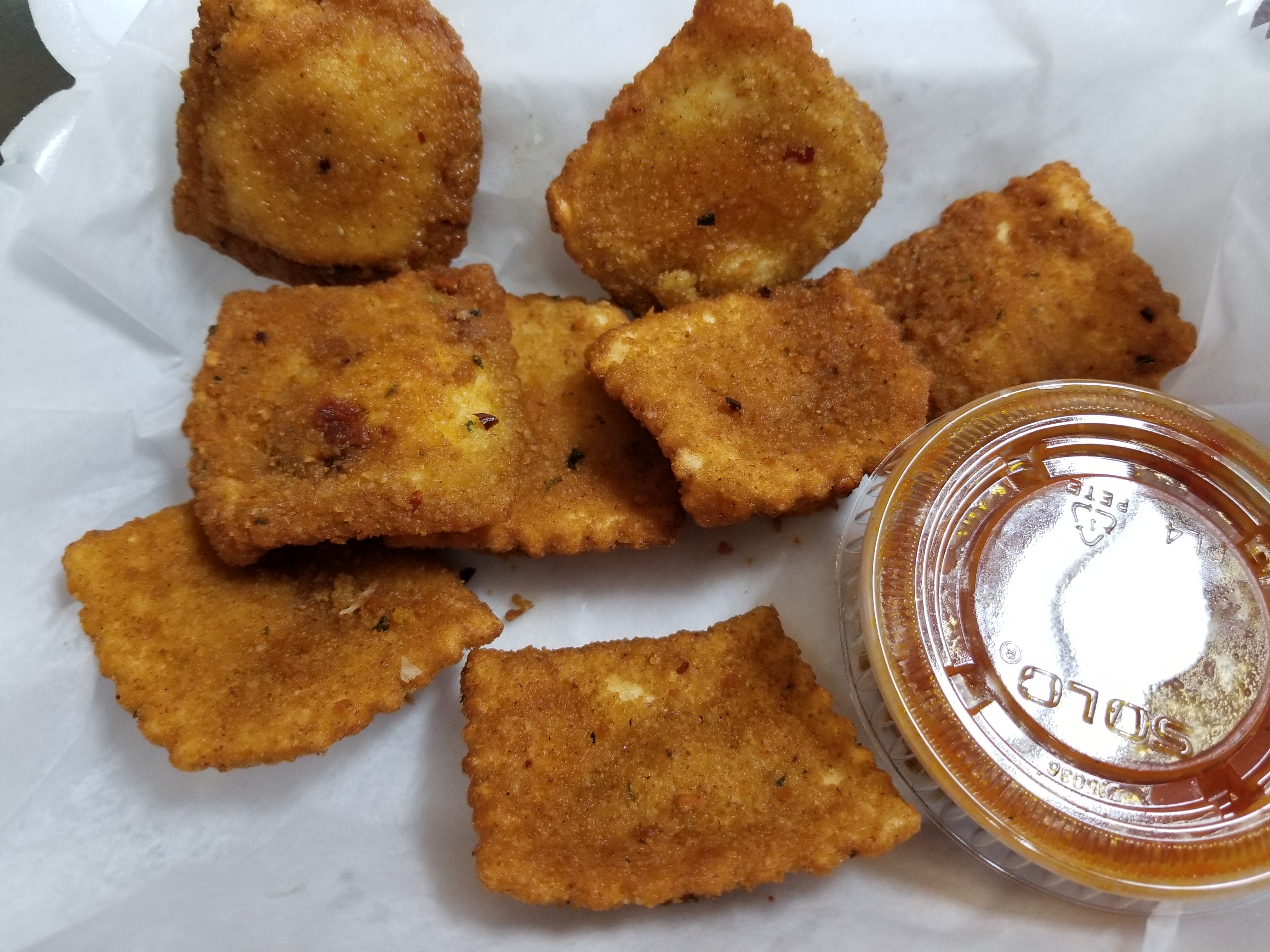 Order 8 Fried Ravioli food online from Pizzeria Gusto store, Providence on bringmethat.com