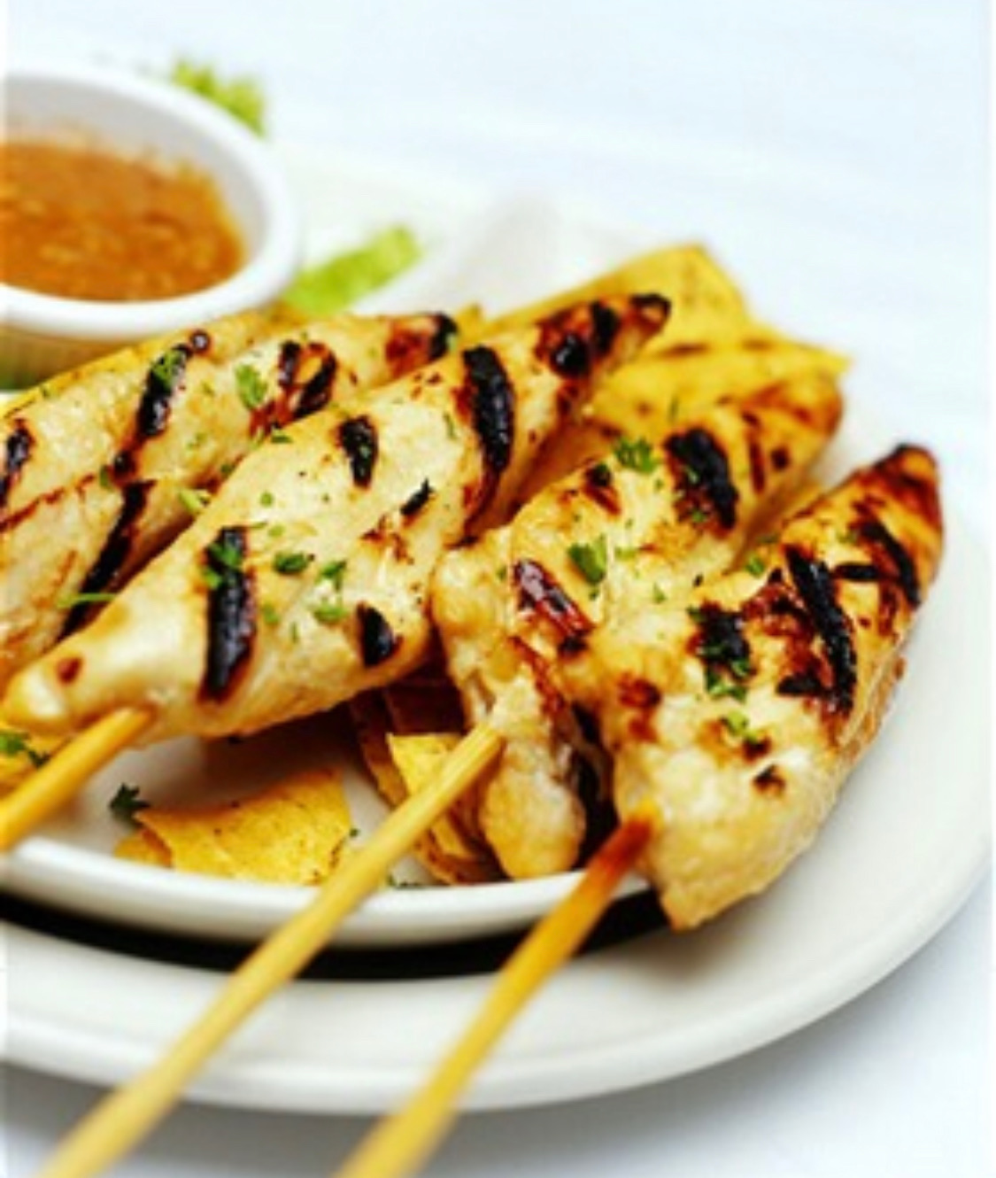 Order Grilled Chicken Satay food online from Pho Thai-Lao Kitchen store, Maywood on bringmethat.com