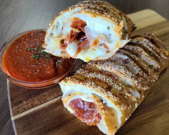 Order Pepperoni and Cheese Stromboli food online from Jalapenos Pizza & Wings store, Laredo on bringmethat.com