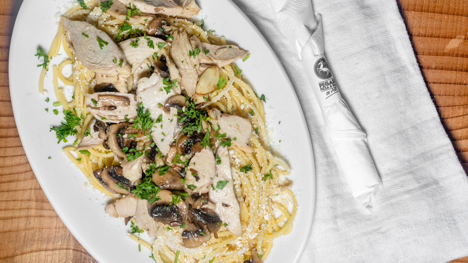 Order Chicken & Mushroom White Spaghetti food online from Pegasus Pizza and Pasta store, Seattle on bringmethat.com
