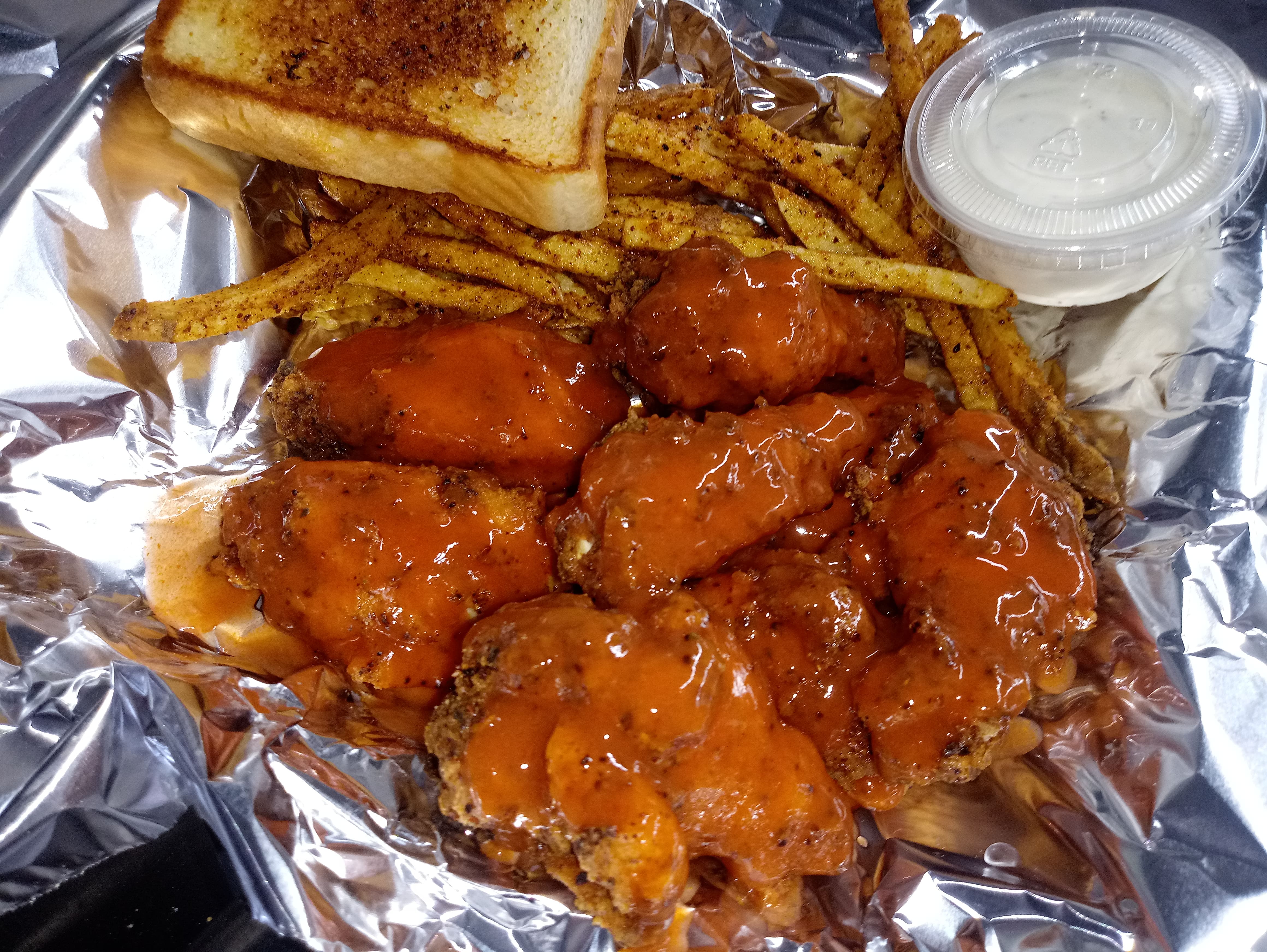 Order 8 Piece Buffalo Wing Plate food online from Tastee Buddies store, Katy on bringmethat.com