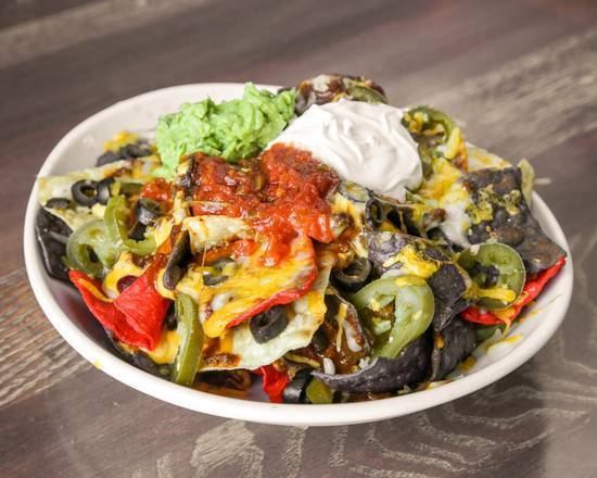 Order Nachos food online from PT's Gold store, Henderson on bringmethat.com