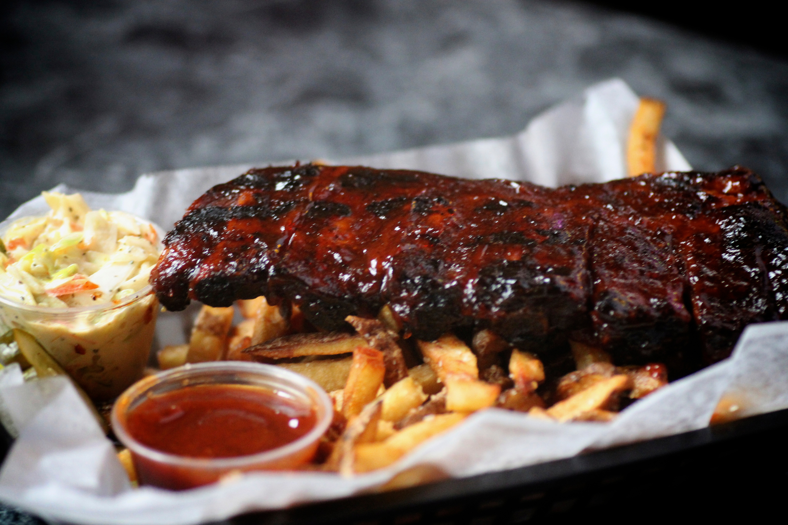 Order Apple & Cherry Wood House-Smoked Ribs food online from Toons Bar & Grill store, Chicago on bringmethat.com