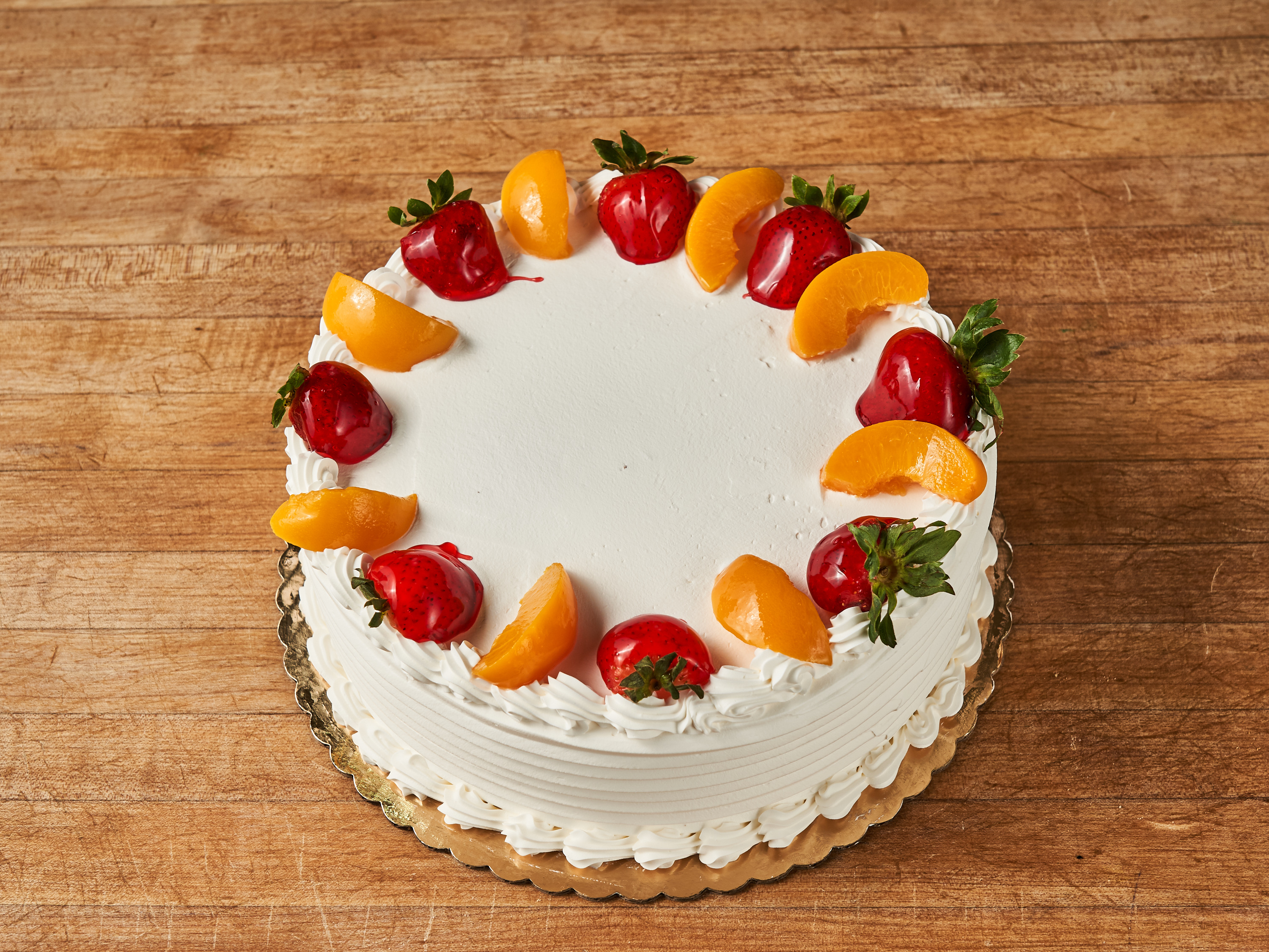 Order Strawberry and Peaches Tres Leches food online from La Gran Via Bakery store, Brooklyn on bringmethat.com
