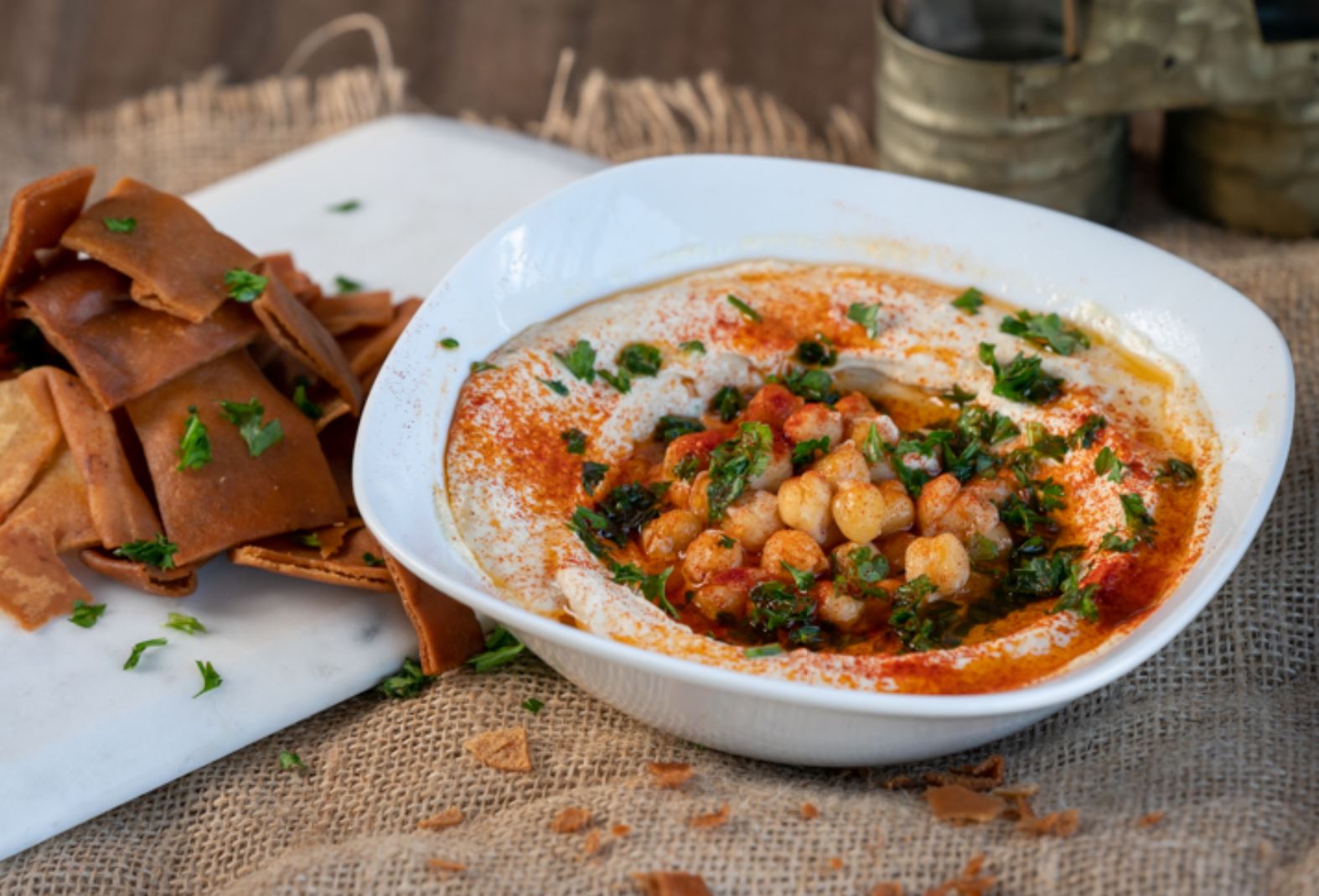 Order Hummus food online from The Butcher Grille store, Dearborn on bringmethat.com