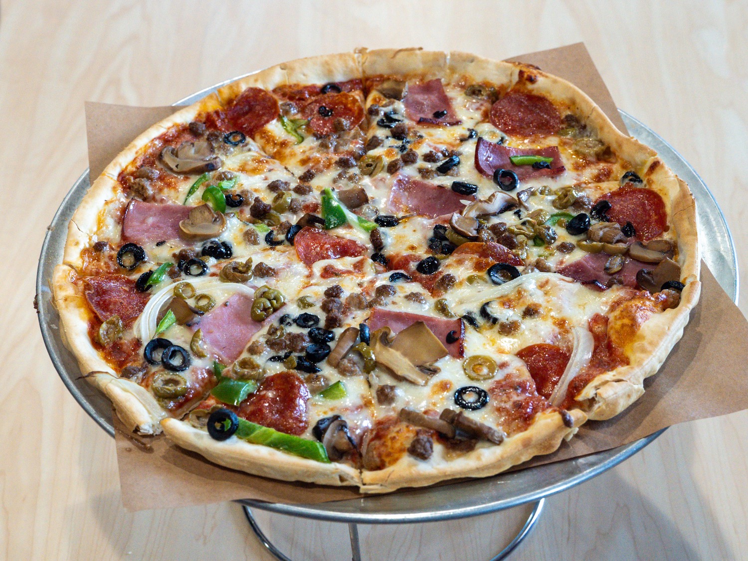 Order The Works Supreme Pizza food online from In Out Pizza store, Morristown on bringmethat.com