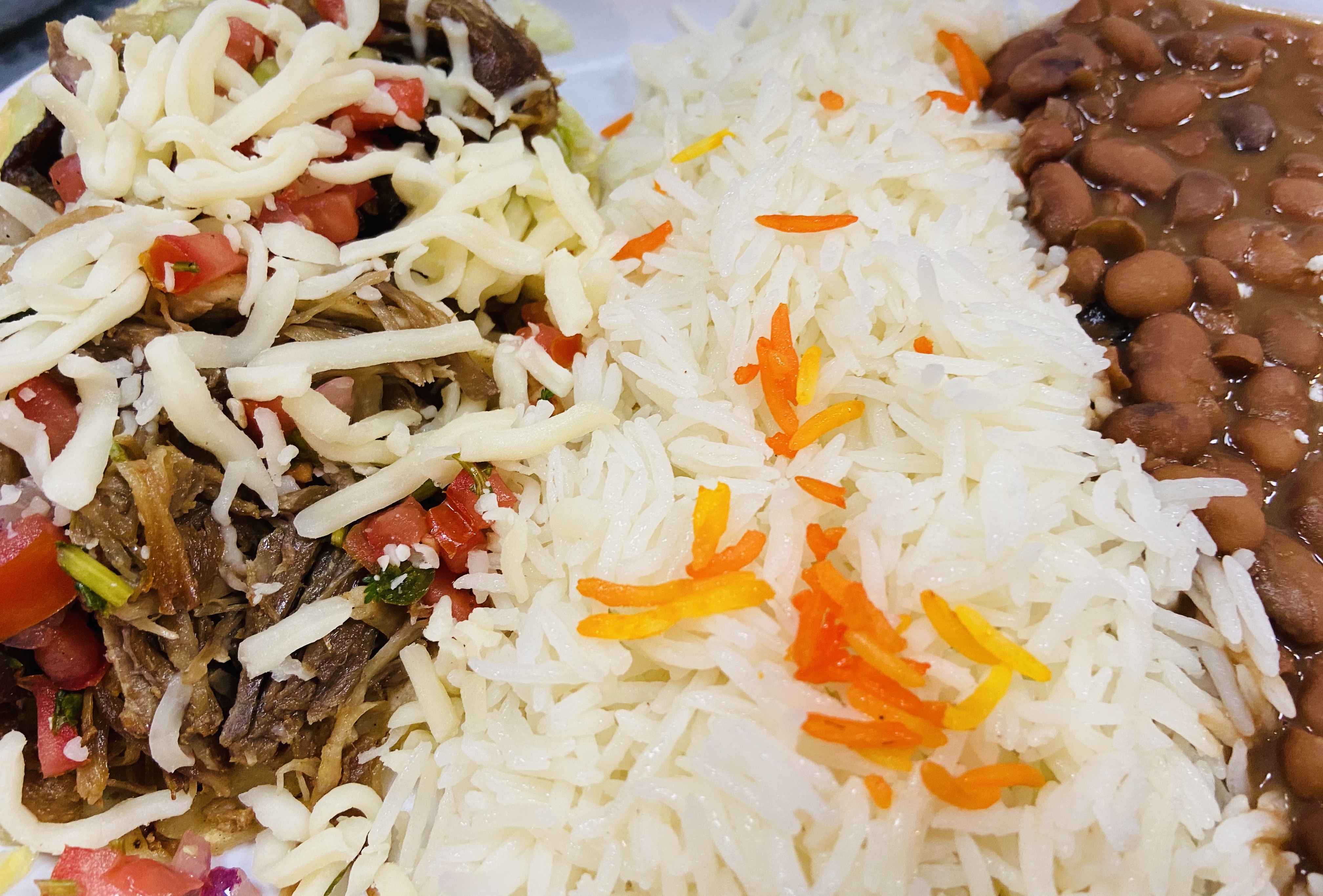 Order Carnitas Taco Plate food online from Off The Boat Fish Grill store, Tustin on bringmethat.com
