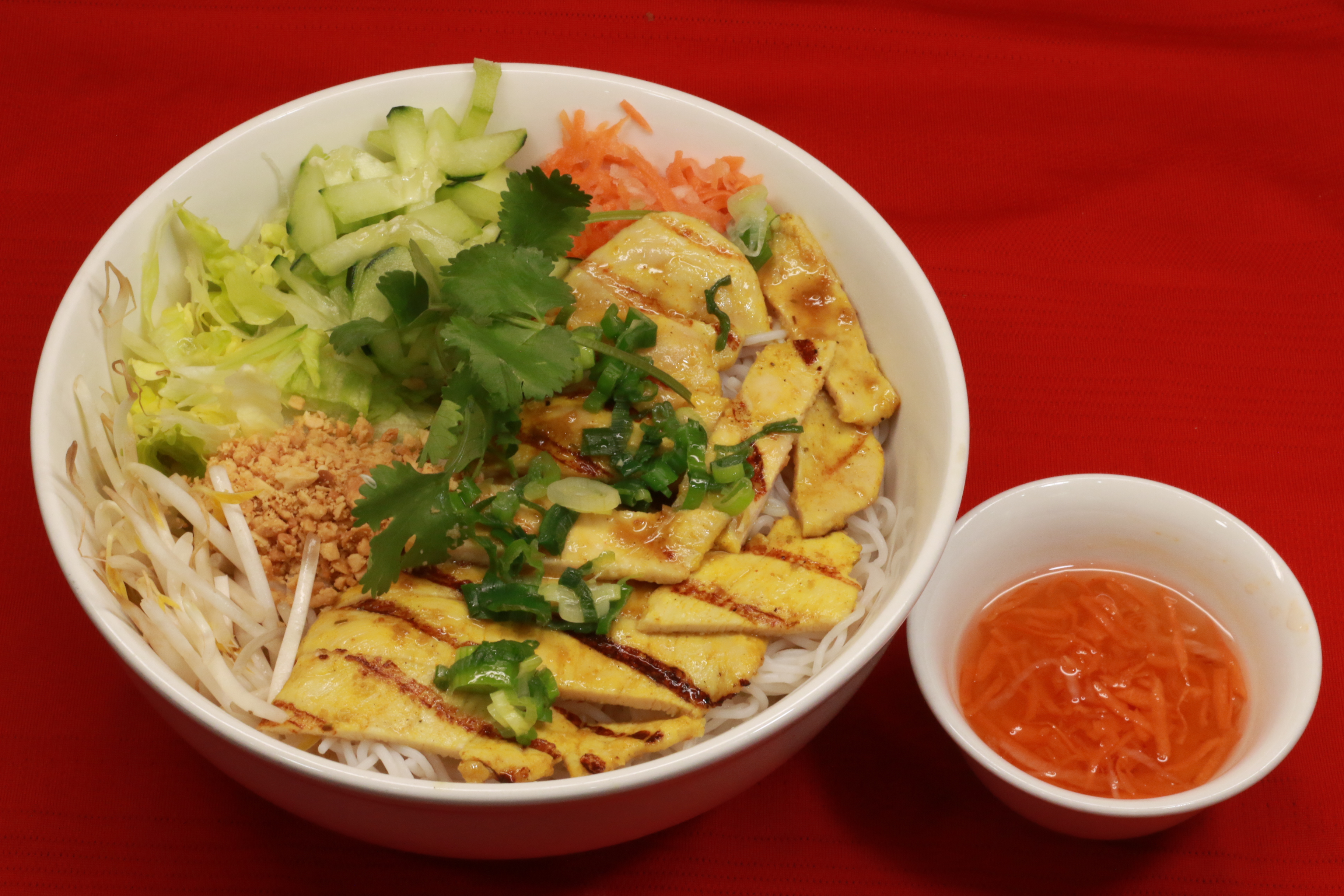Order V4. Grilled Chicken Noodle Bowl food online from Pho Khang store, Englewood on bringmethat.com