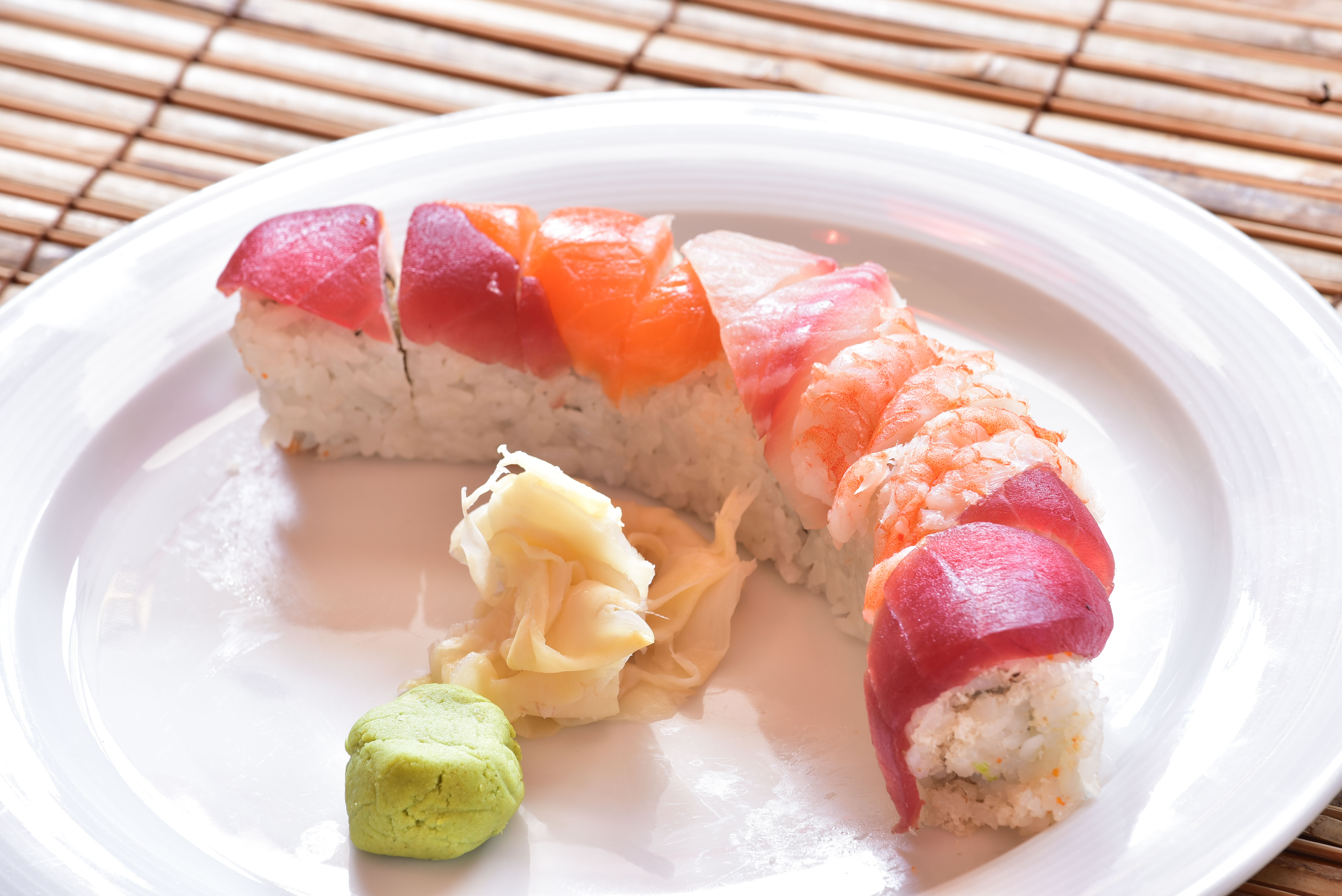 Order Rainbow Roll food online from Tono Sushi store, Washington on bringmethat.com
