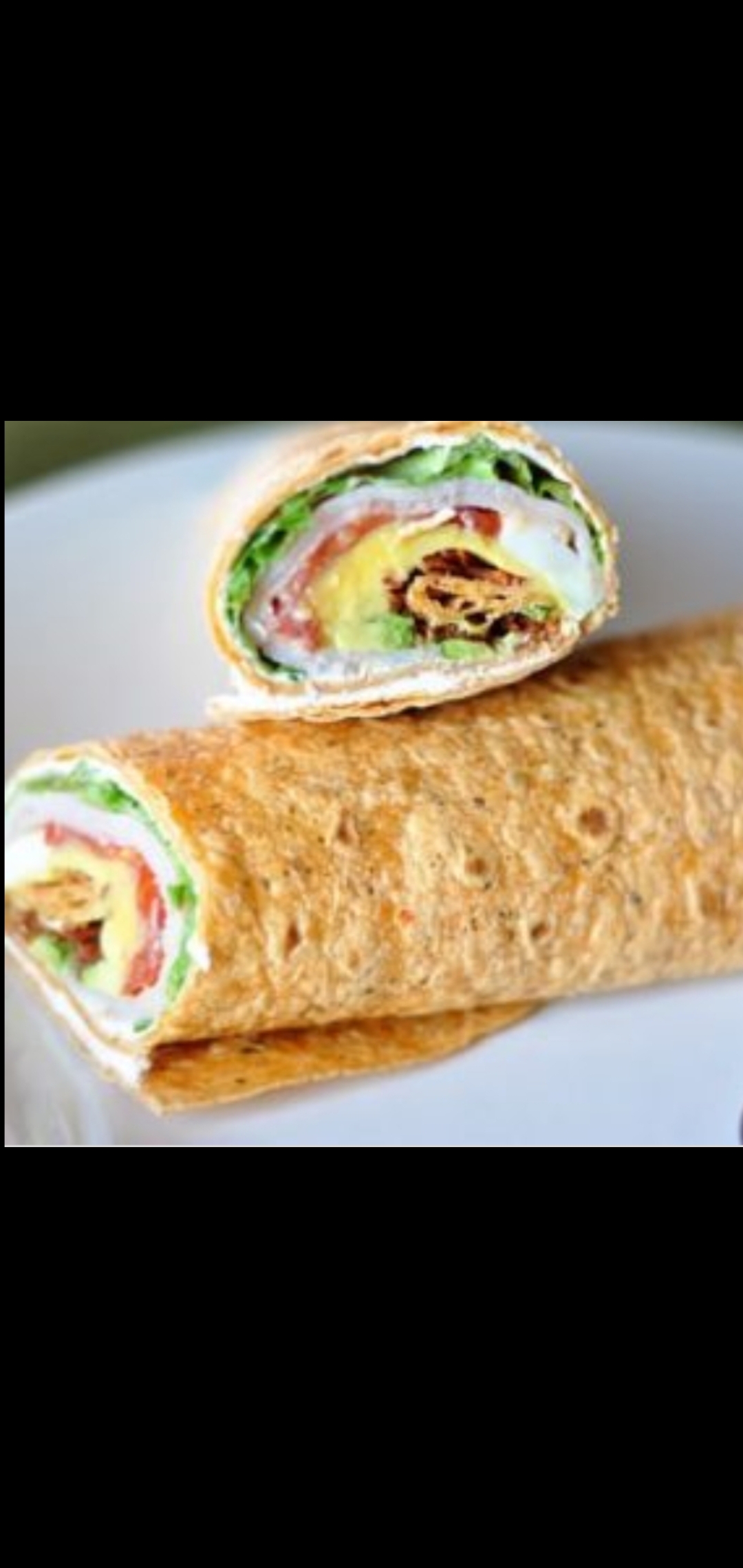 Order  Boar's Head Smoked Turkey And Brie Cheese Wrap (smoked turkey brie cheese lettuce plum tomatoes) food online from American Gourmet Foods Deli store, New York on bringmethat.com