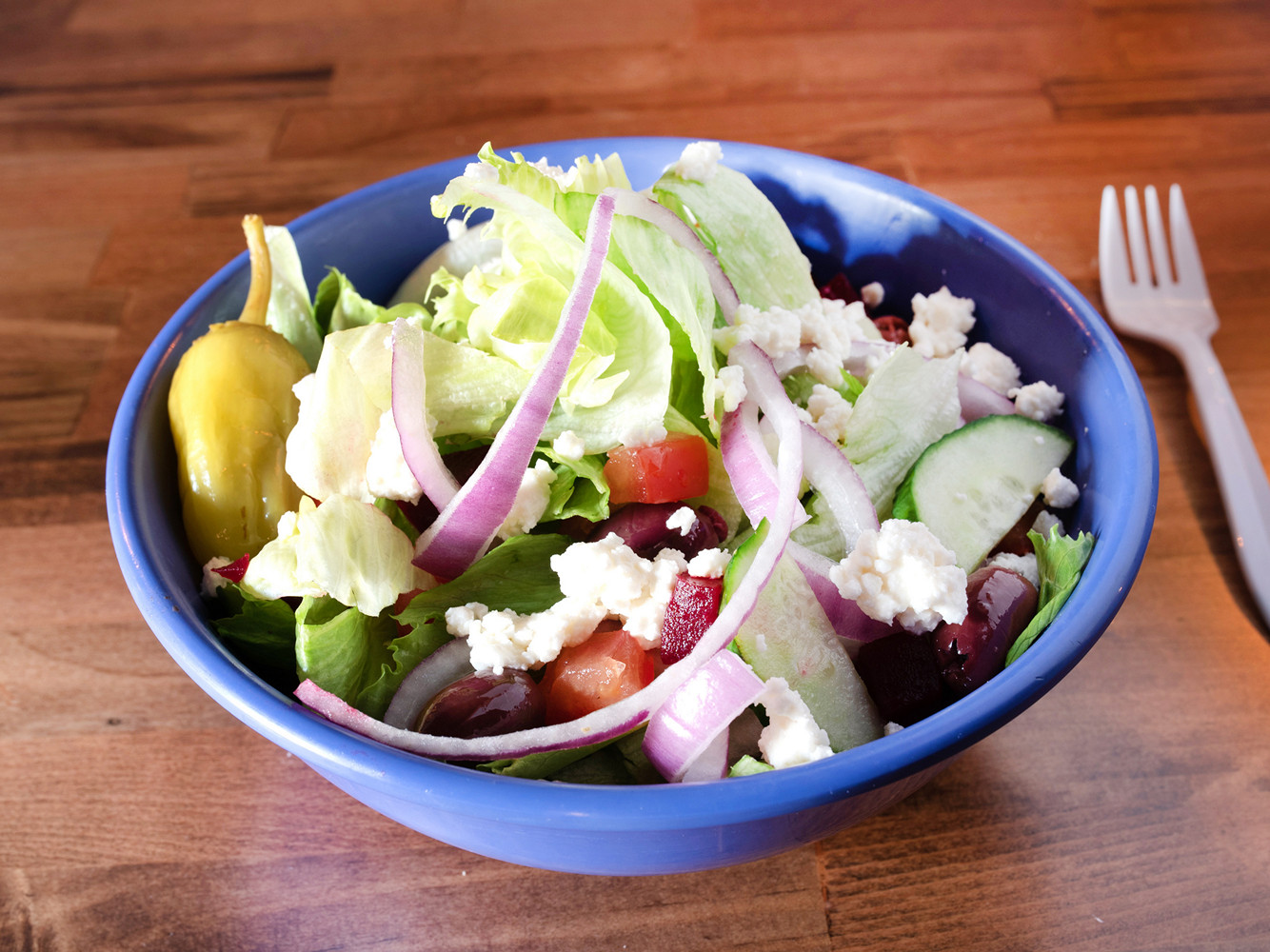 Order Greek Salad food online from Blinks Deli store, Long Island City on bringmethat.com