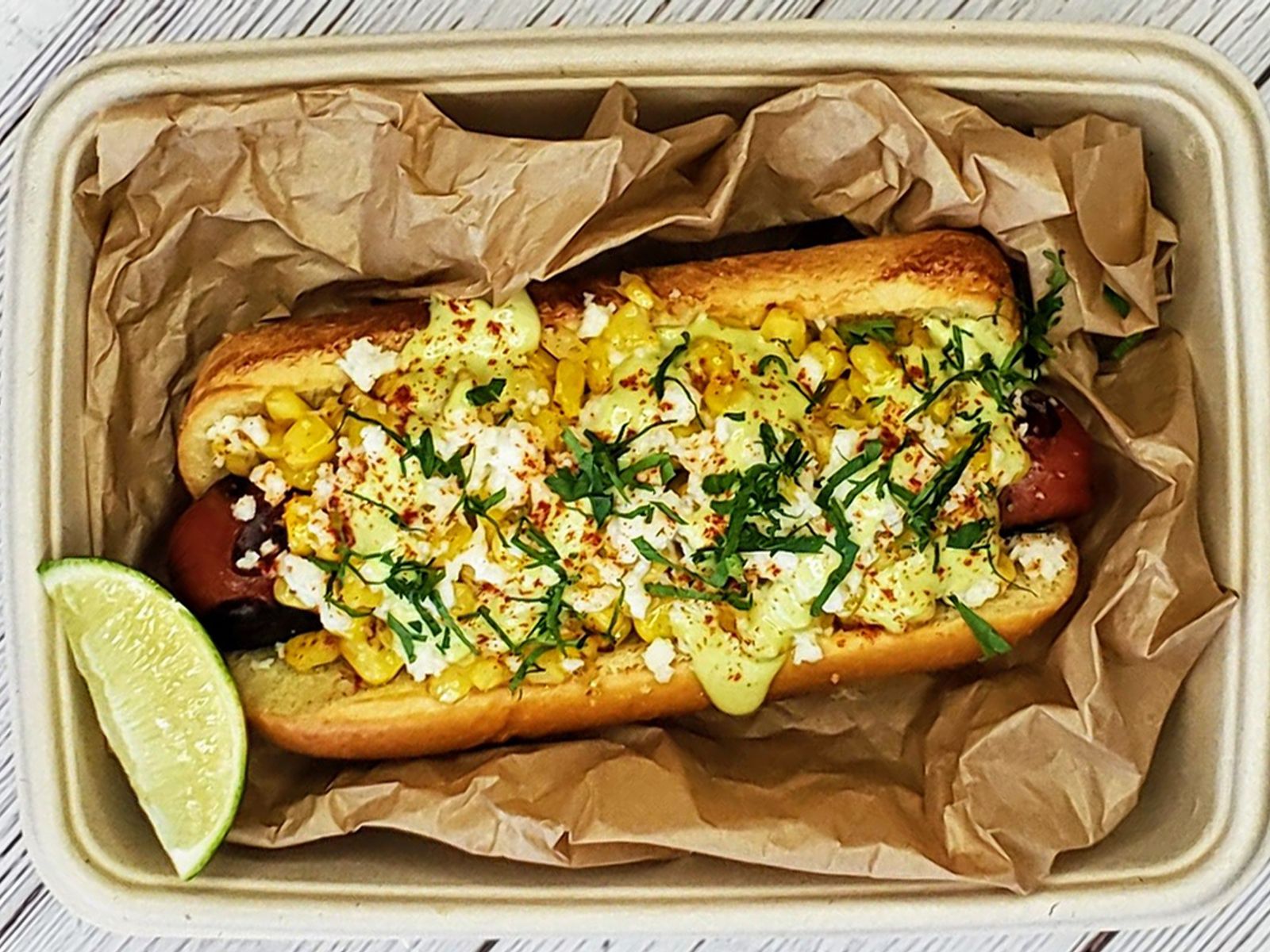 Order Elote Dog food online from Woofers Hot Dogs store, Burbank on bringmethat.com