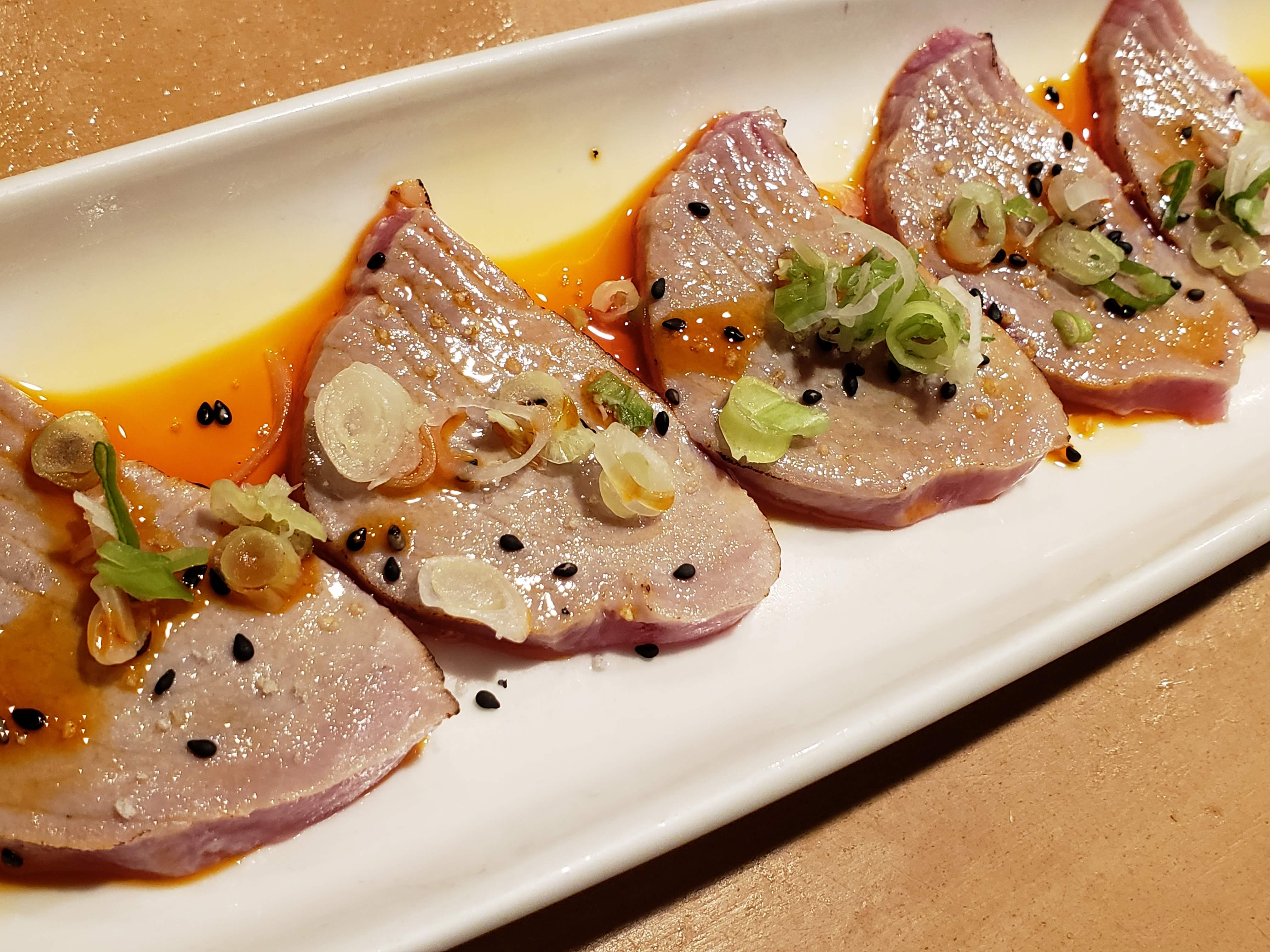 Order Tuna Tadaki food online from Nikko Sushi store, Arlington Heights on bringmethat.com