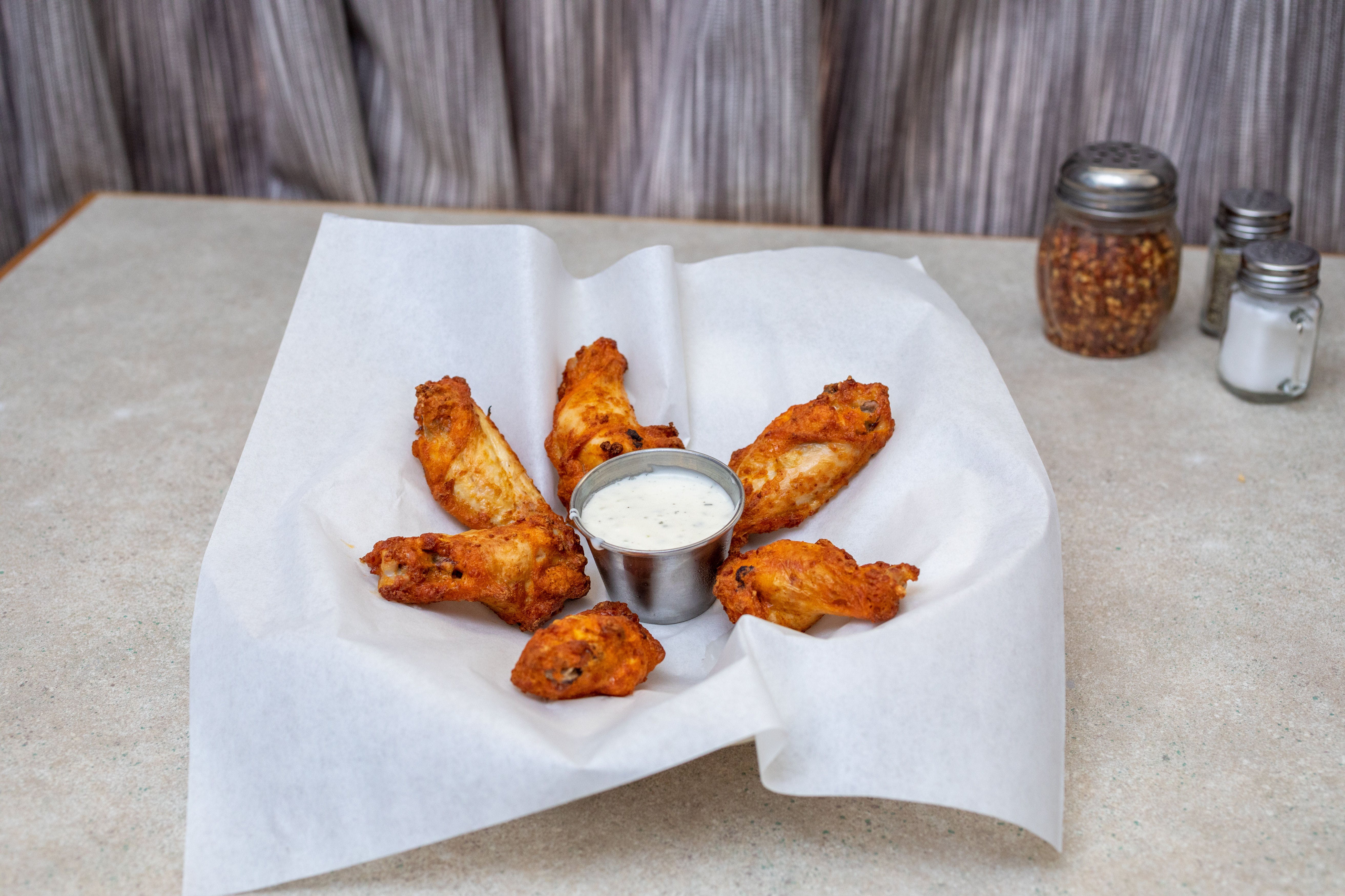 Order Buffalo Wings - 6 Wings food online from Saucy's Pizza store, Littleton on bringmethat.com