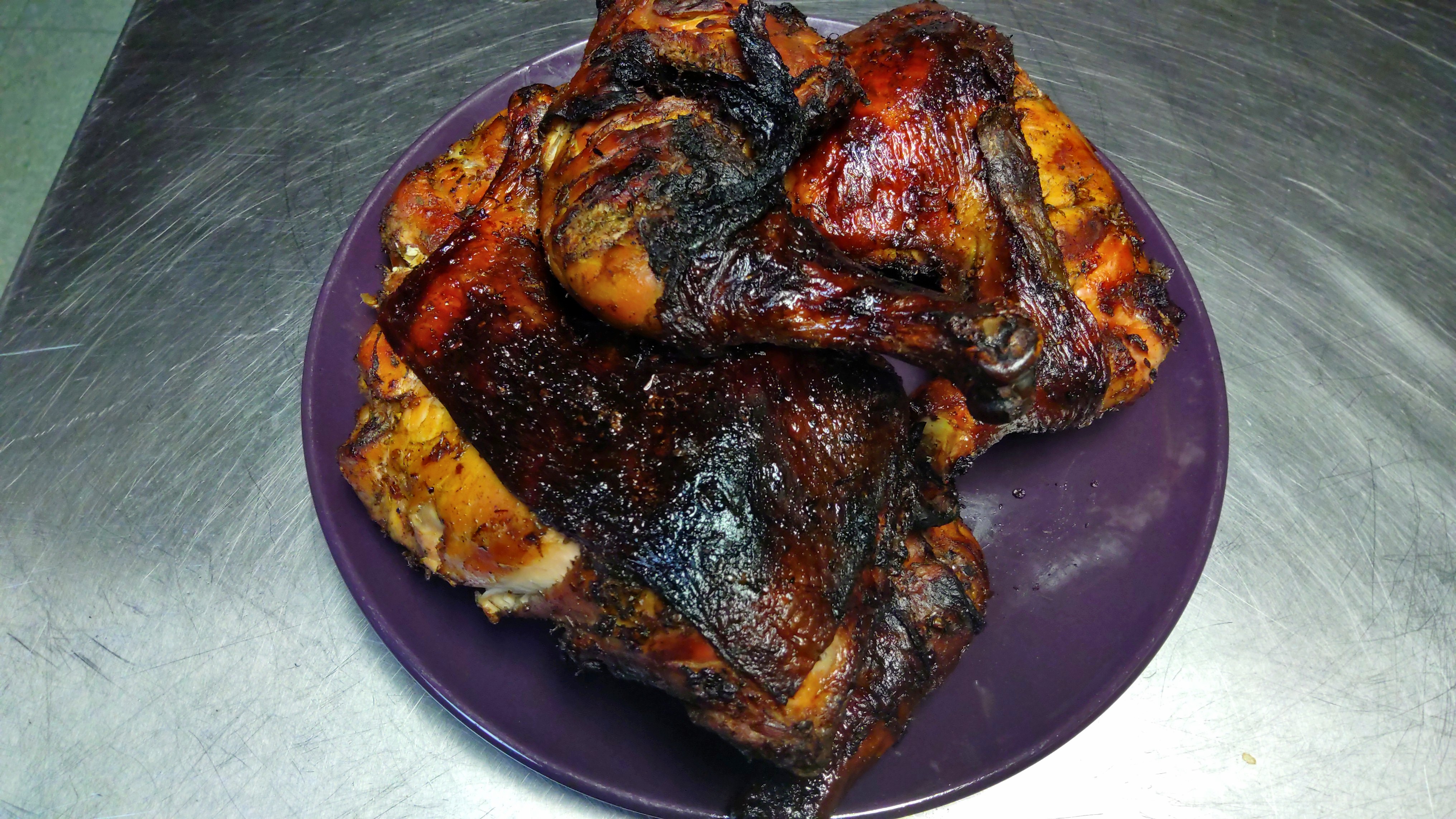 Order 7a. Charcoal Jerk Chicken (Dark Meat) food online from Africana Cuisine store, Perry Hall on bringmethat.com