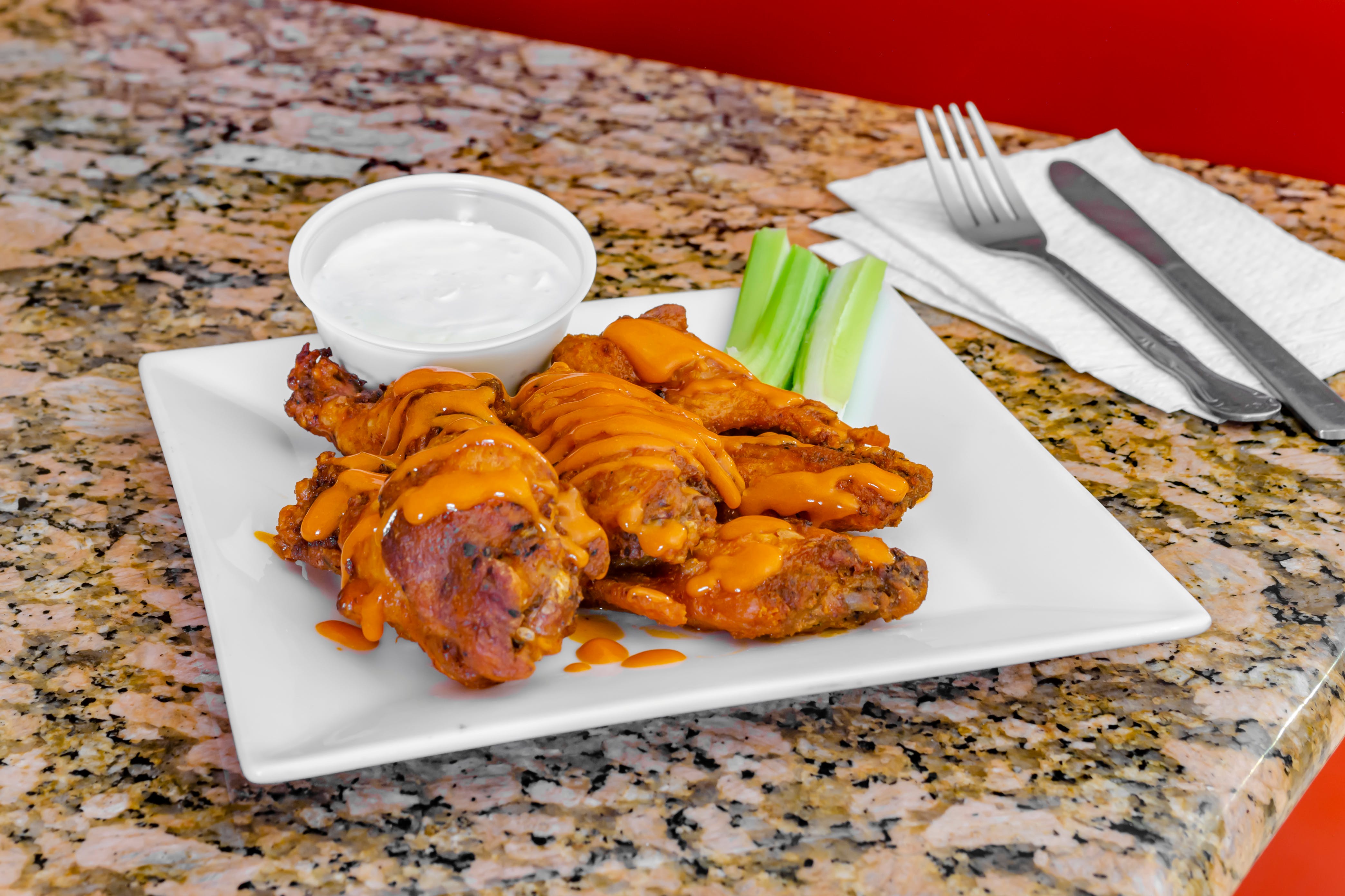 Order Regular Chicken Wings - 6 Pieces food online from Camila's Pizzeria store, Bensalem on bringmethat.com