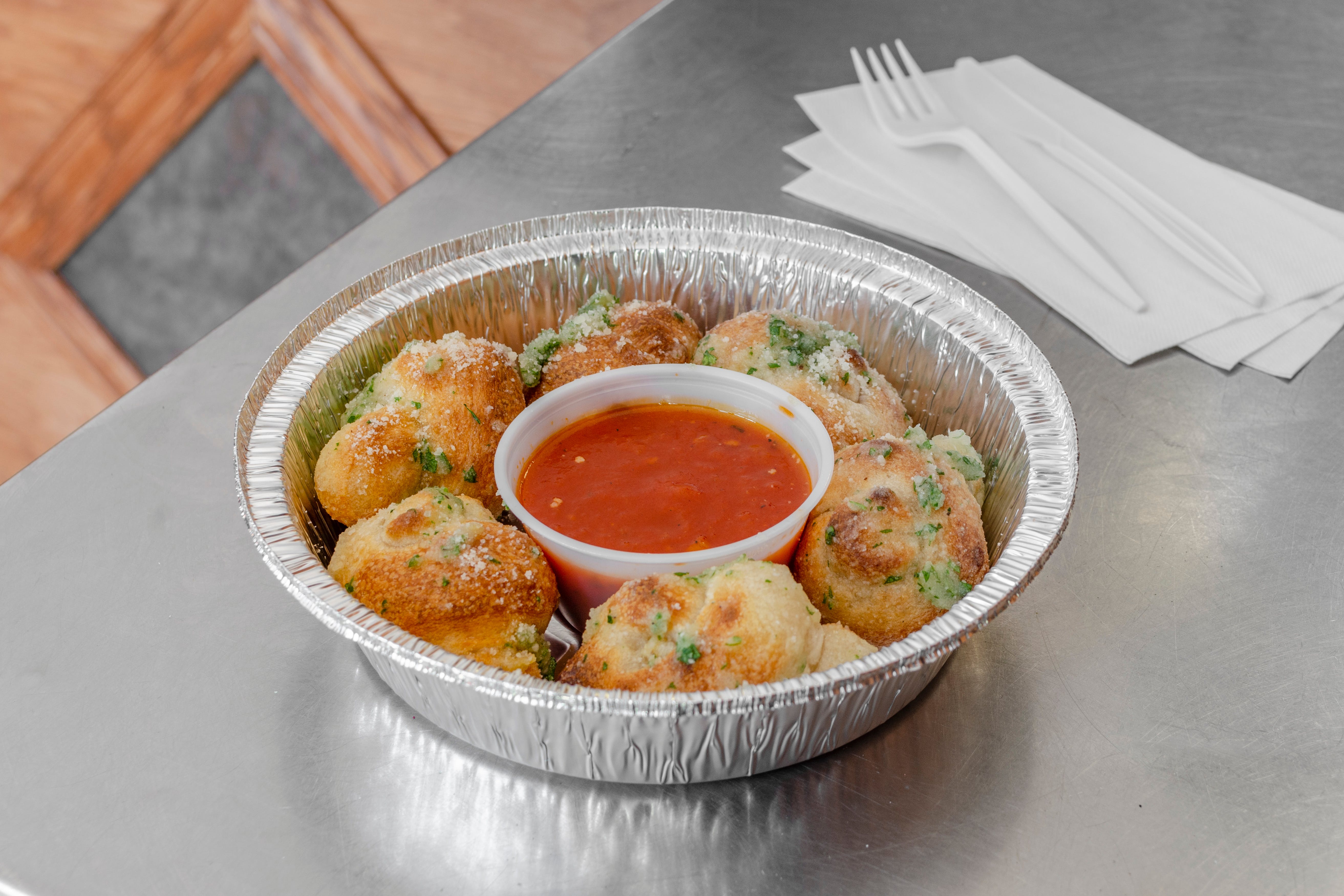 Order Garlic Knots - 6 Pieces food online from Pizza Express store, Elizabeth on bringmethat.com