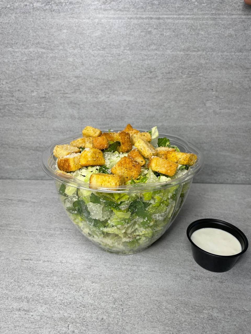 Order Caesar Salad - Salad food online from Troys Italian Kitchen store, Arlington on bringmethat.com
