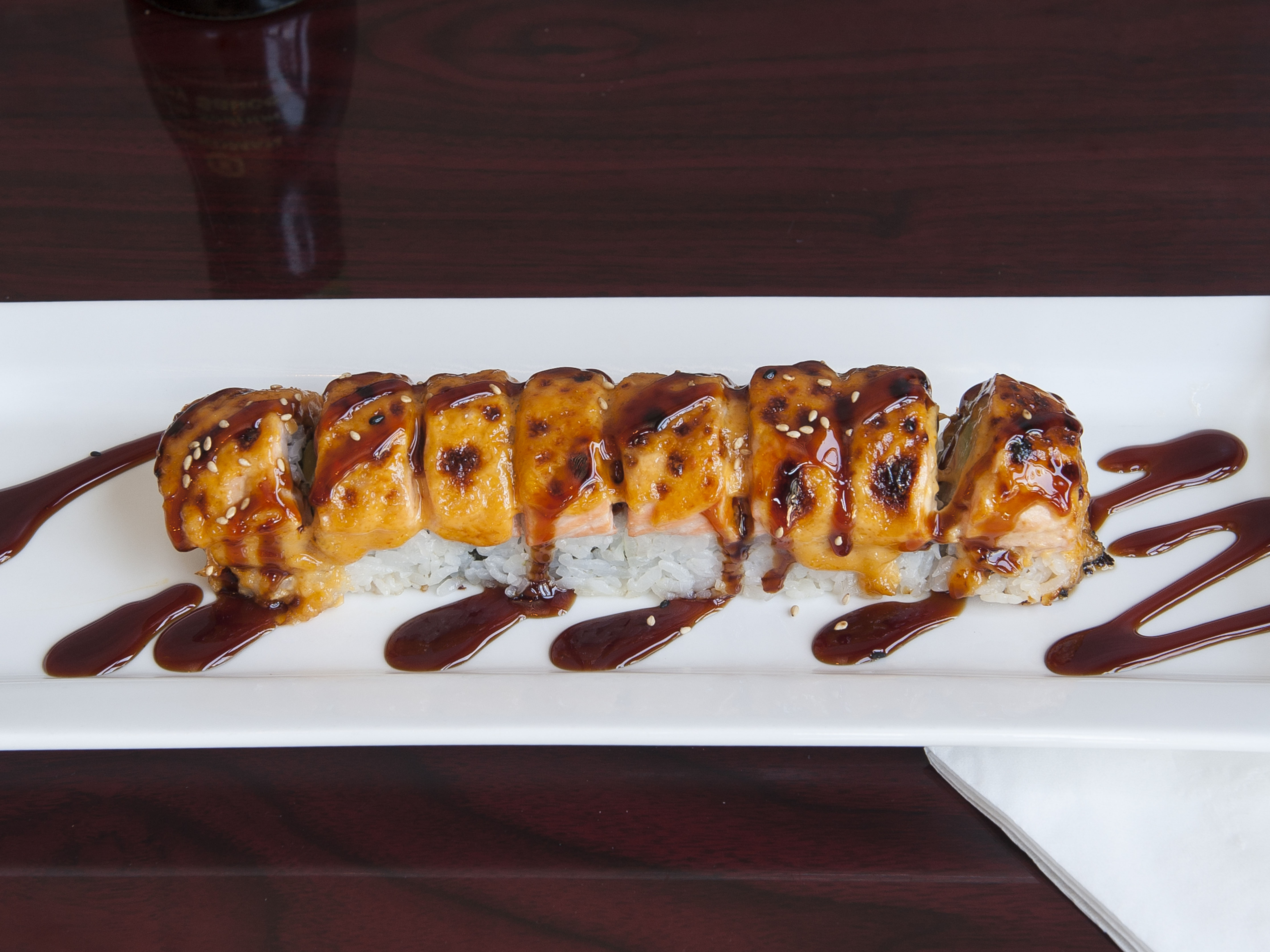 Order Baked Salmon Roll food online from Crave Sushi store, Sherman Oaks on bringmethat.com