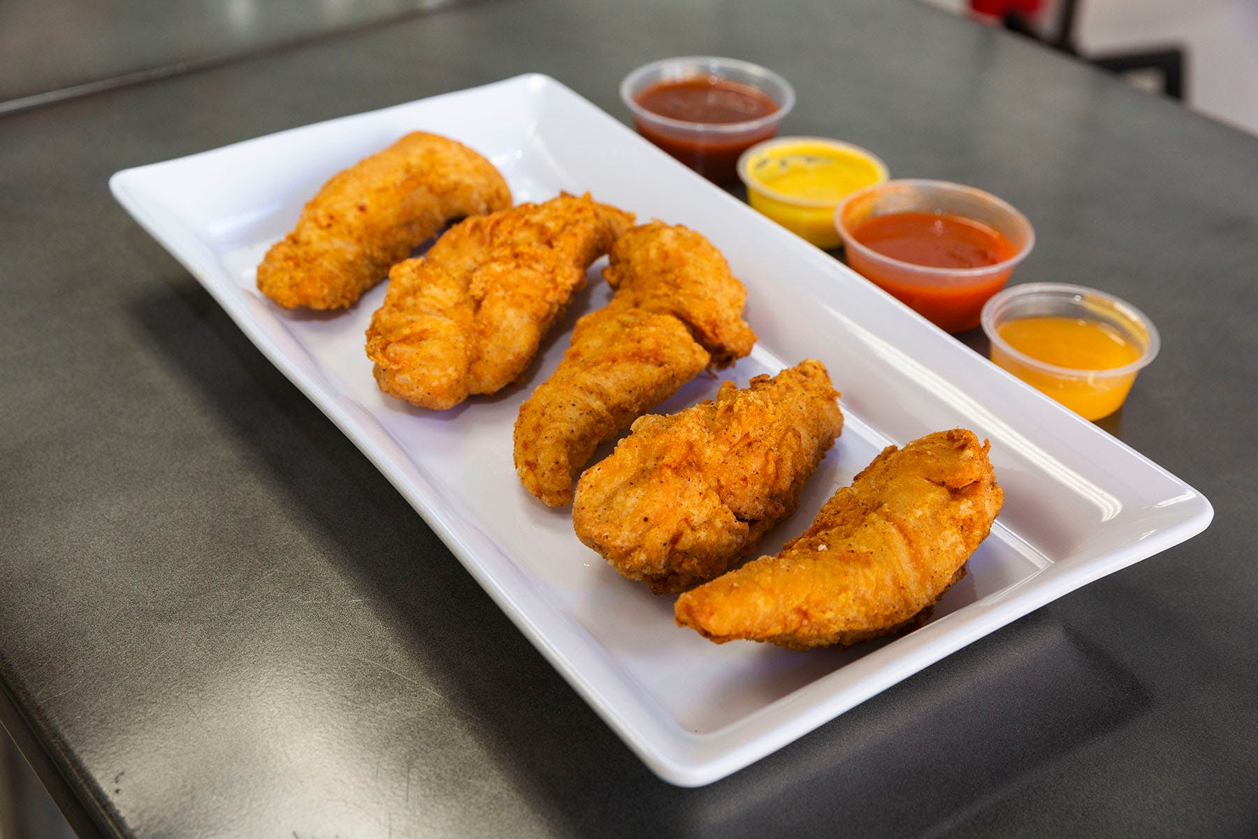 Order Chicken Fingers - 6 Pieces food online from College Pizza store, Boston on bringmethat.com