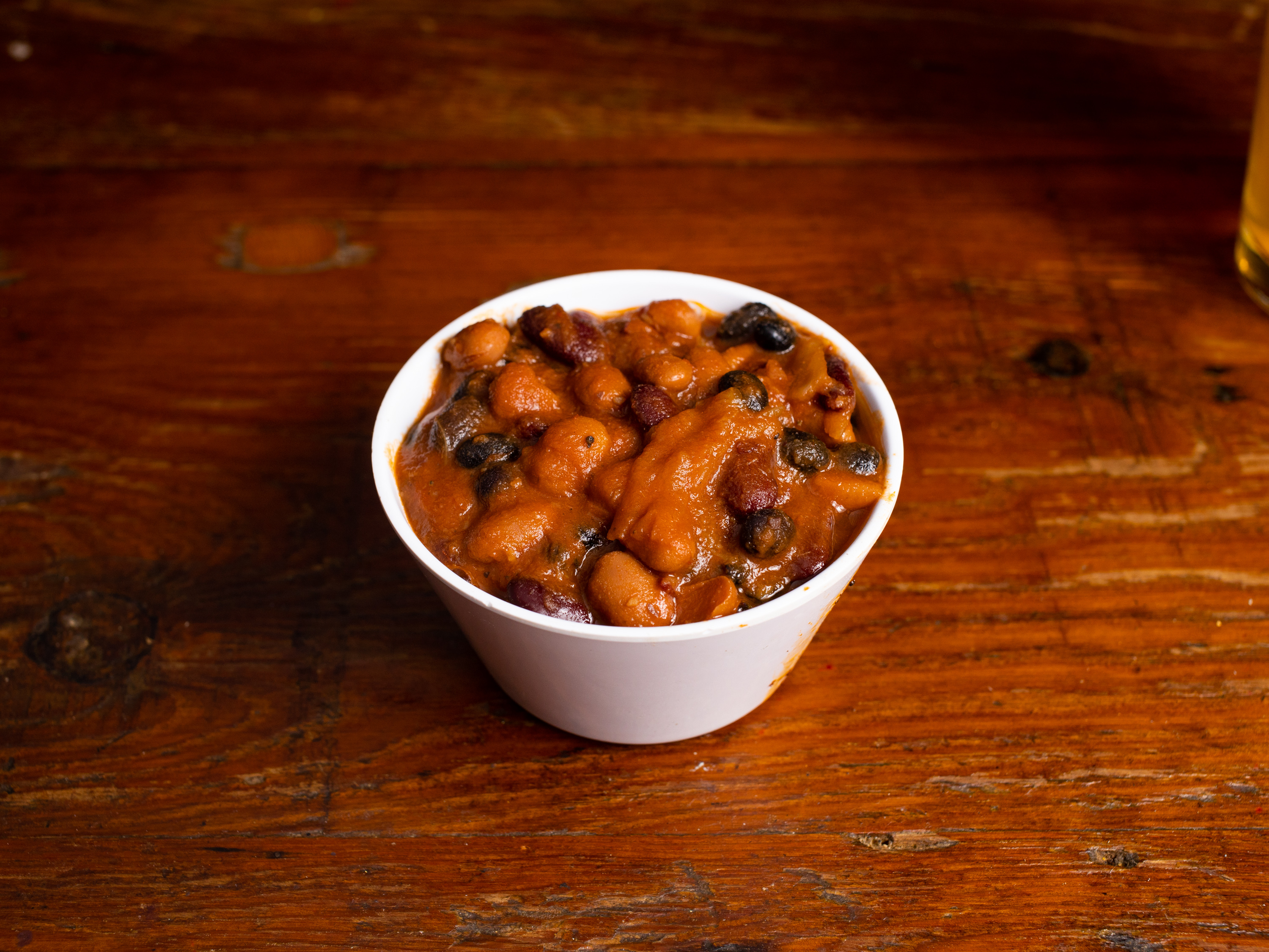 Order Baked Beans food online from Baby Blues Bbq store, San Francisco on bringmethat.com