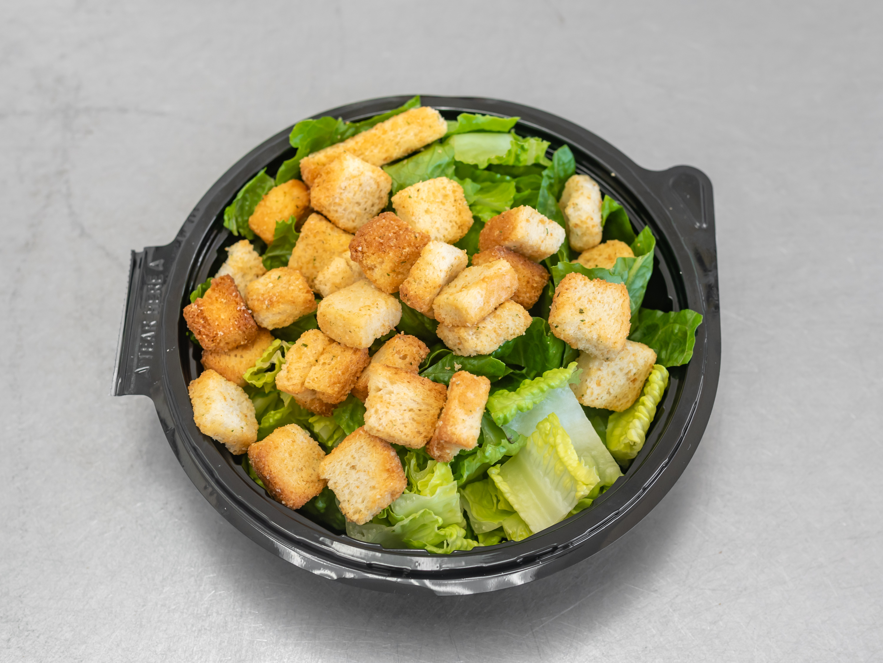 Order 2. Caesar Salad food online from Pizza Mart - 12th St. NE store, Washington on bringmethat.com