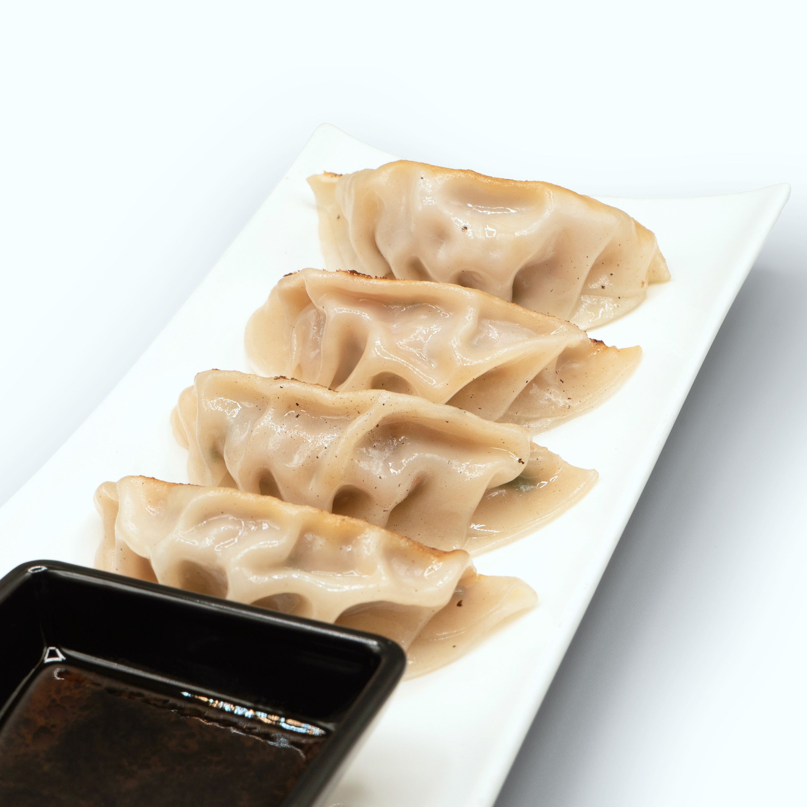 Order Pan Fried Gyoza (Pork) food online from Zutto Japanese American Pub store, New York on bringmethat.com