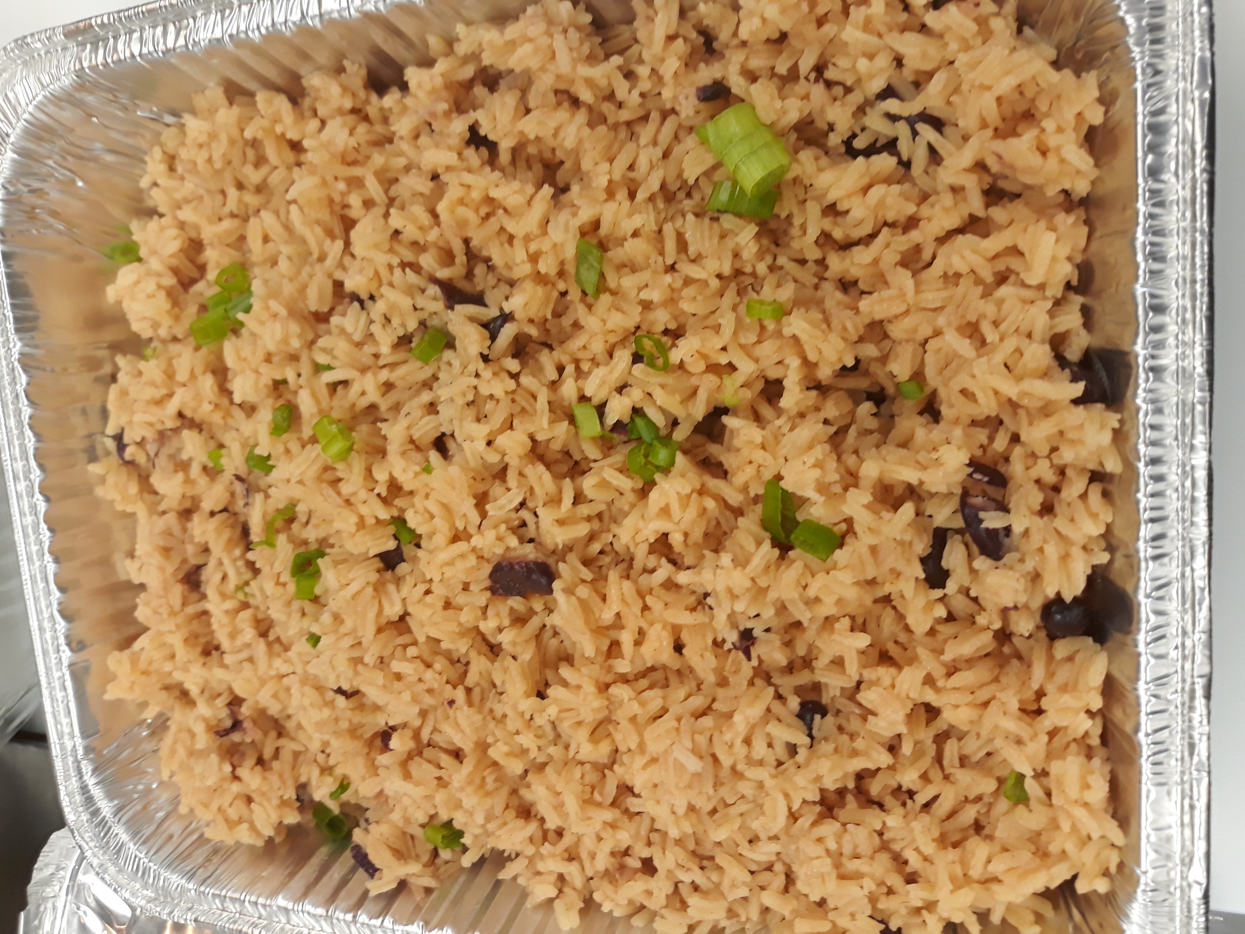 Order Rice & Peas (one pound) food online from Spice Island Grill store, Colorado Springs on bringmethat.com