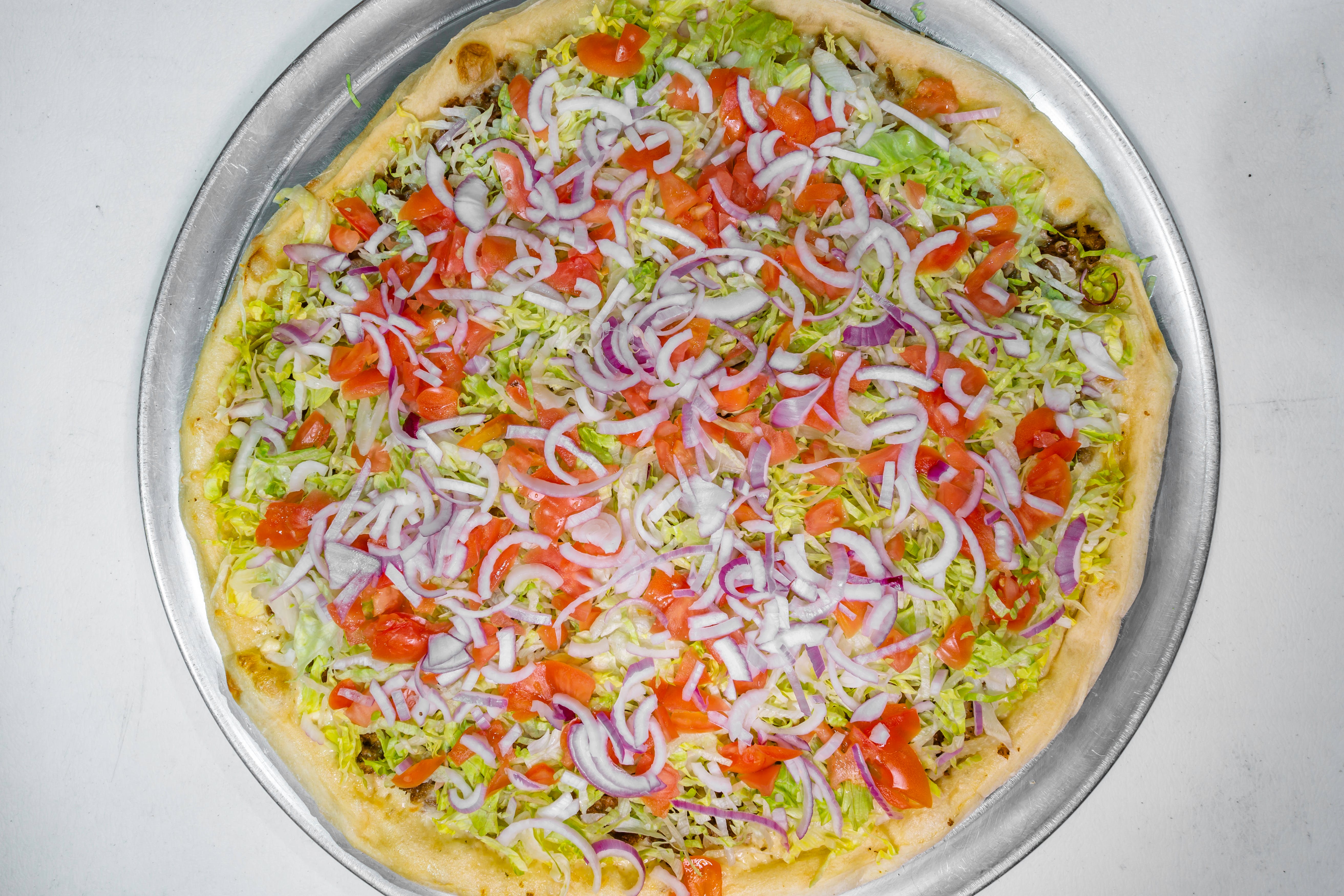 Order Vegetarian Pizza - Large food online from Pizza Como store, Lehighton on bringmethat.com