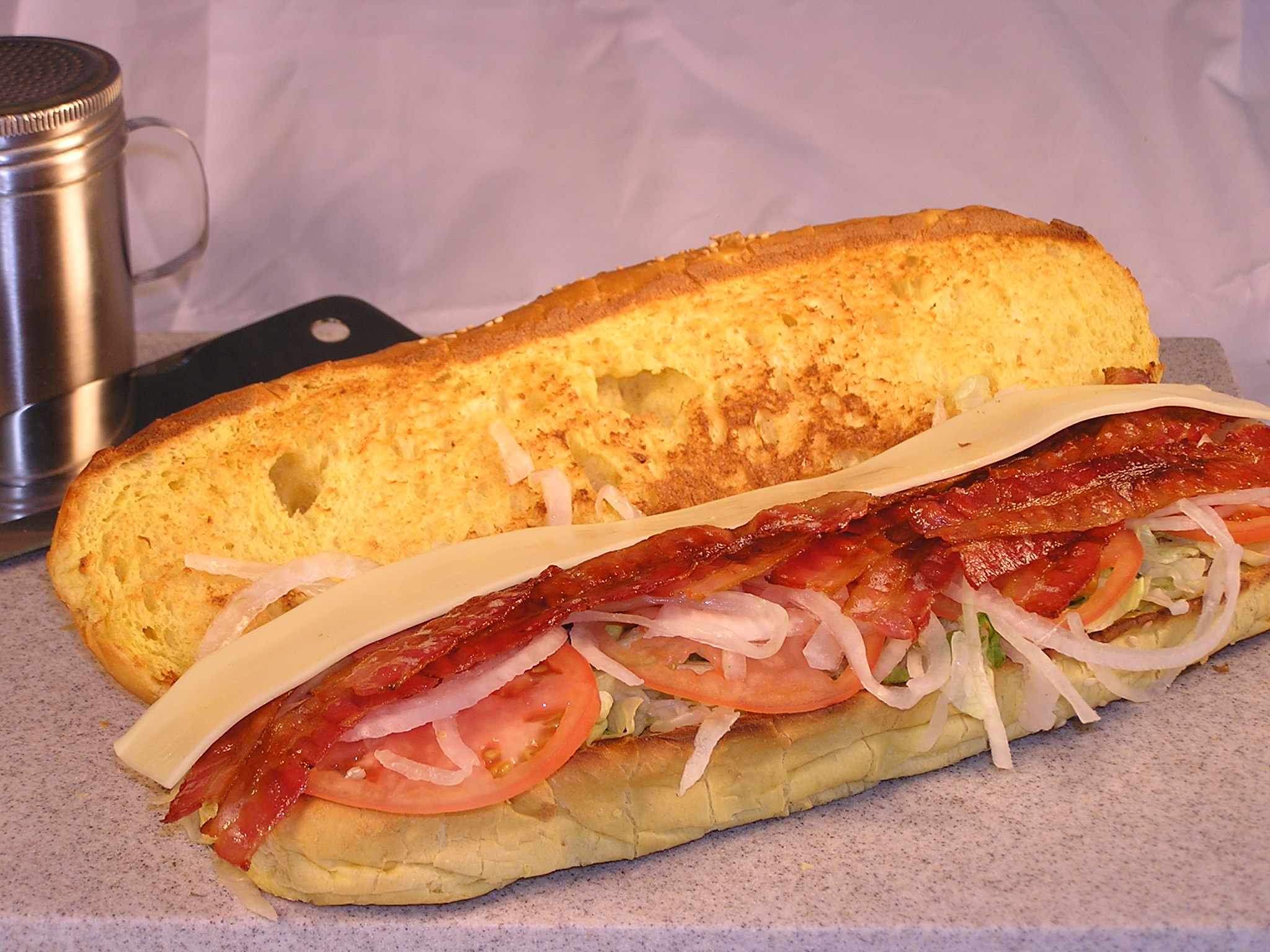 Order BLT Sub food online from Calz Pizza Subs & Chicken Wings store, Virginia Beach on bringmethat.com