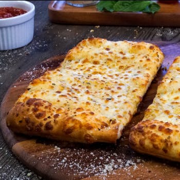 Order Cheesy Breadsticks - 3/4 lb. food online from Fox's Pizza Den store, New Bethlehem on bringmethat.com