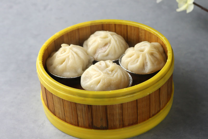 Order C18. Steamed Shanghai Dumpling with Pork   上海小笼包 food online from Feng Ze Yuan store, San Francisco on bringmethat.com