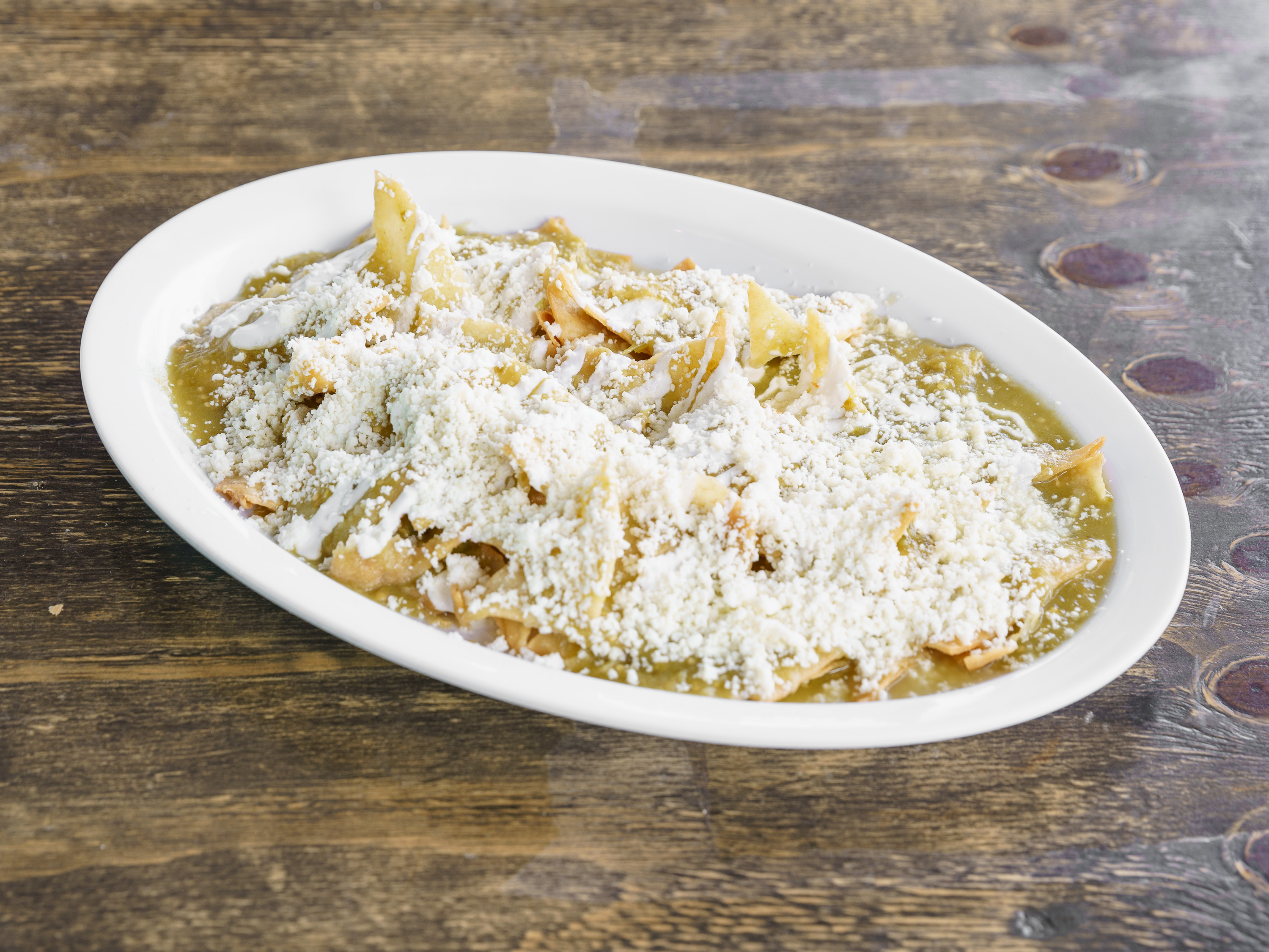 Order Chilaquiles food online from Los Chilangos Restaurant store, Anaheim on bringmethat.com