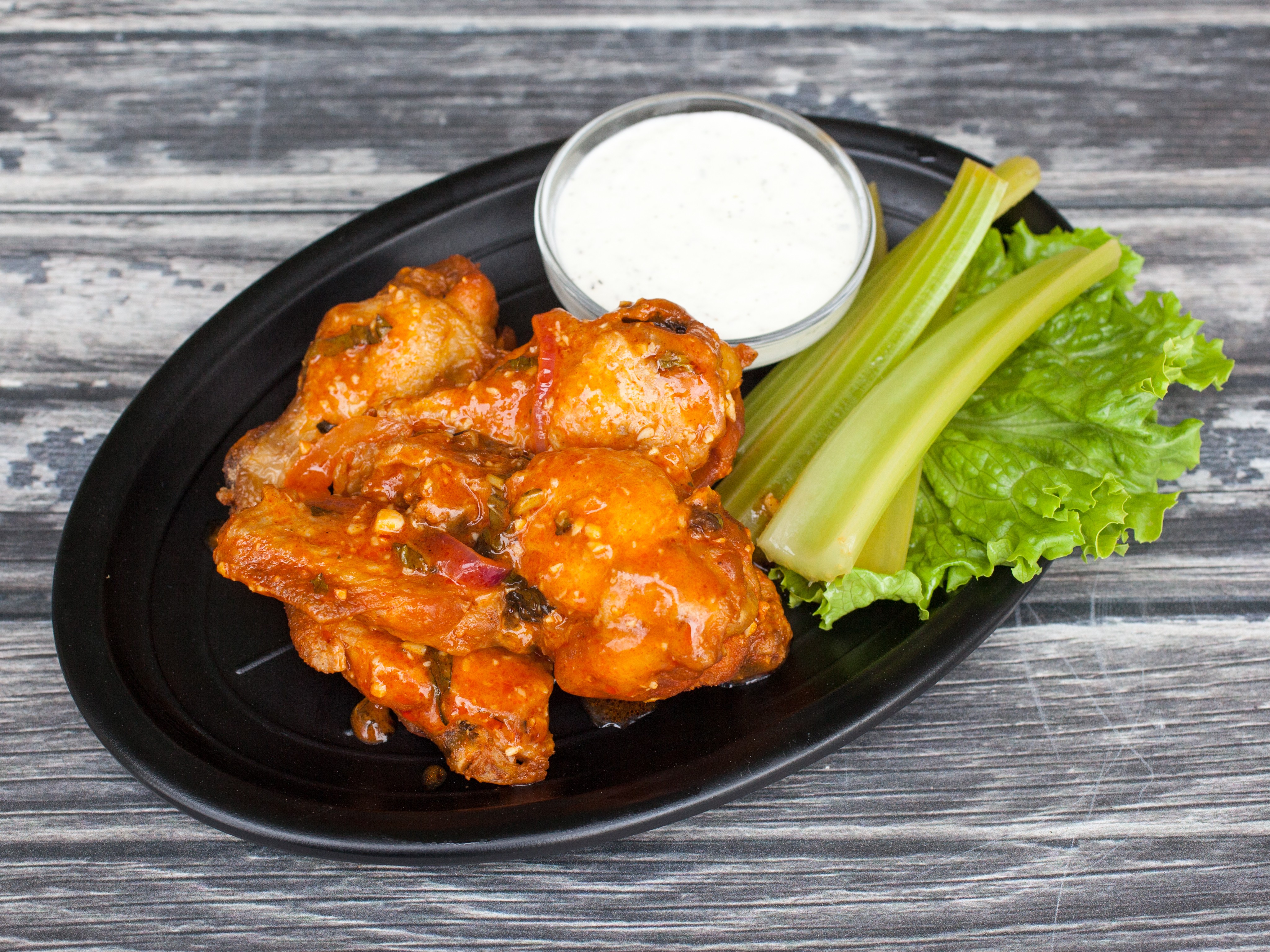 Order 6 Pieces Wings food online from Nicolinos Italian Restaurant store, Cathedral City on bringmethat.com