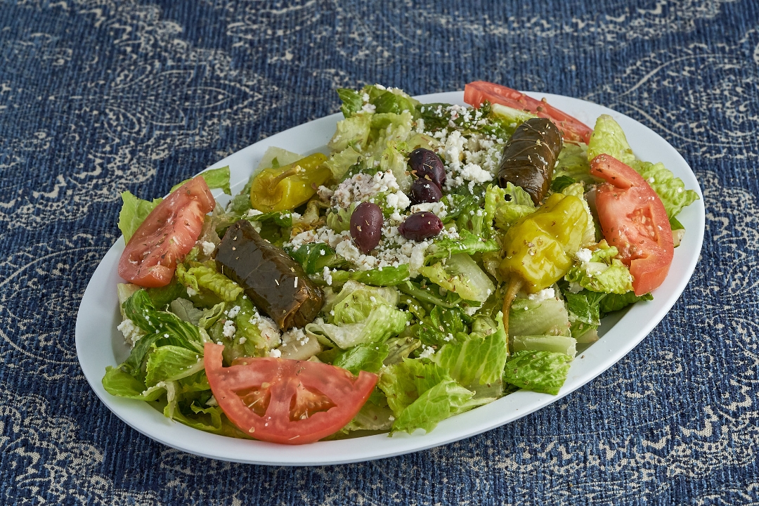 Order Greek Salad Large food online from Demo'S Greek Food store, San Antonio on bringmethat.com