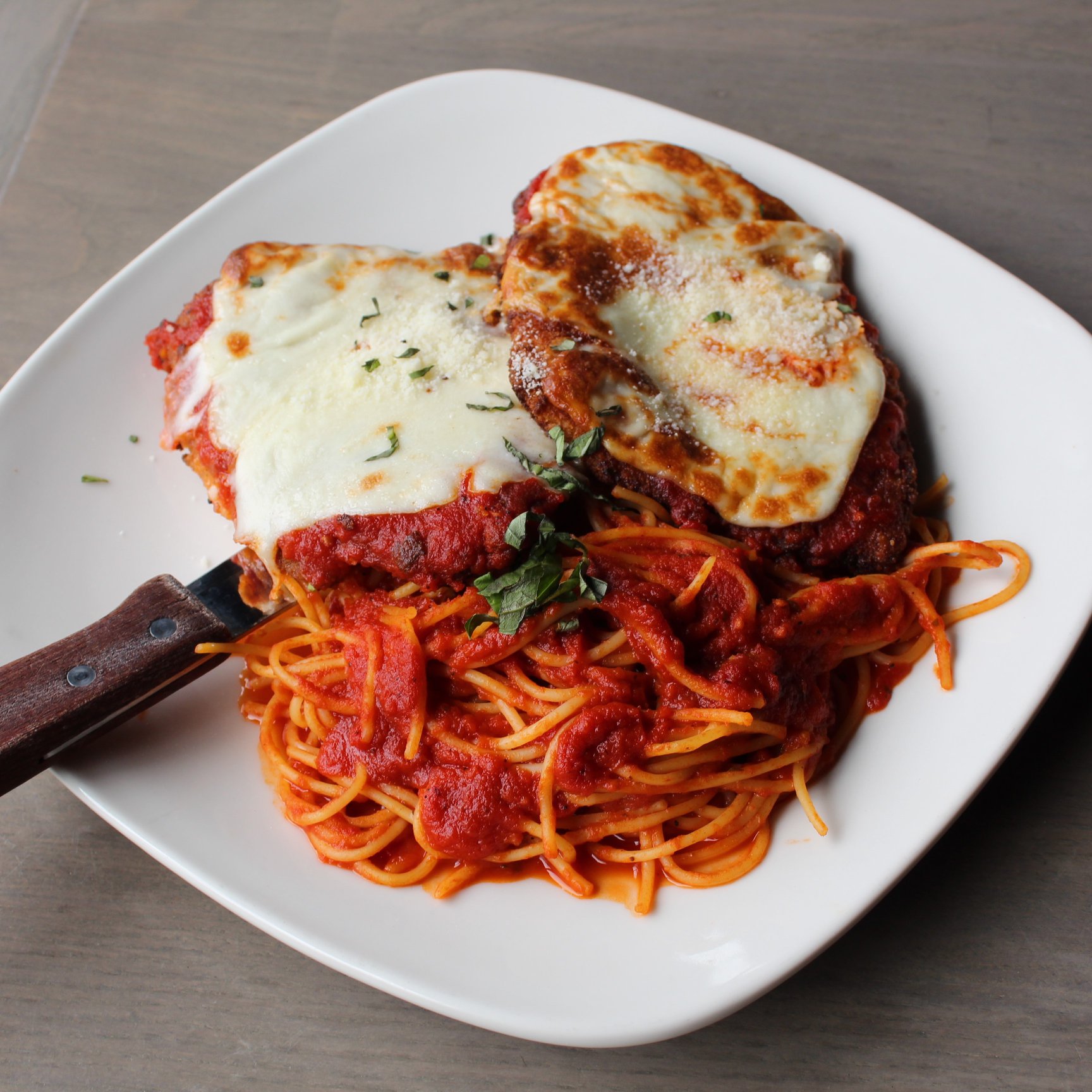 Order Chicken Parmigiana food online from Uccello's store, Grand Rapids on bringmethat.com