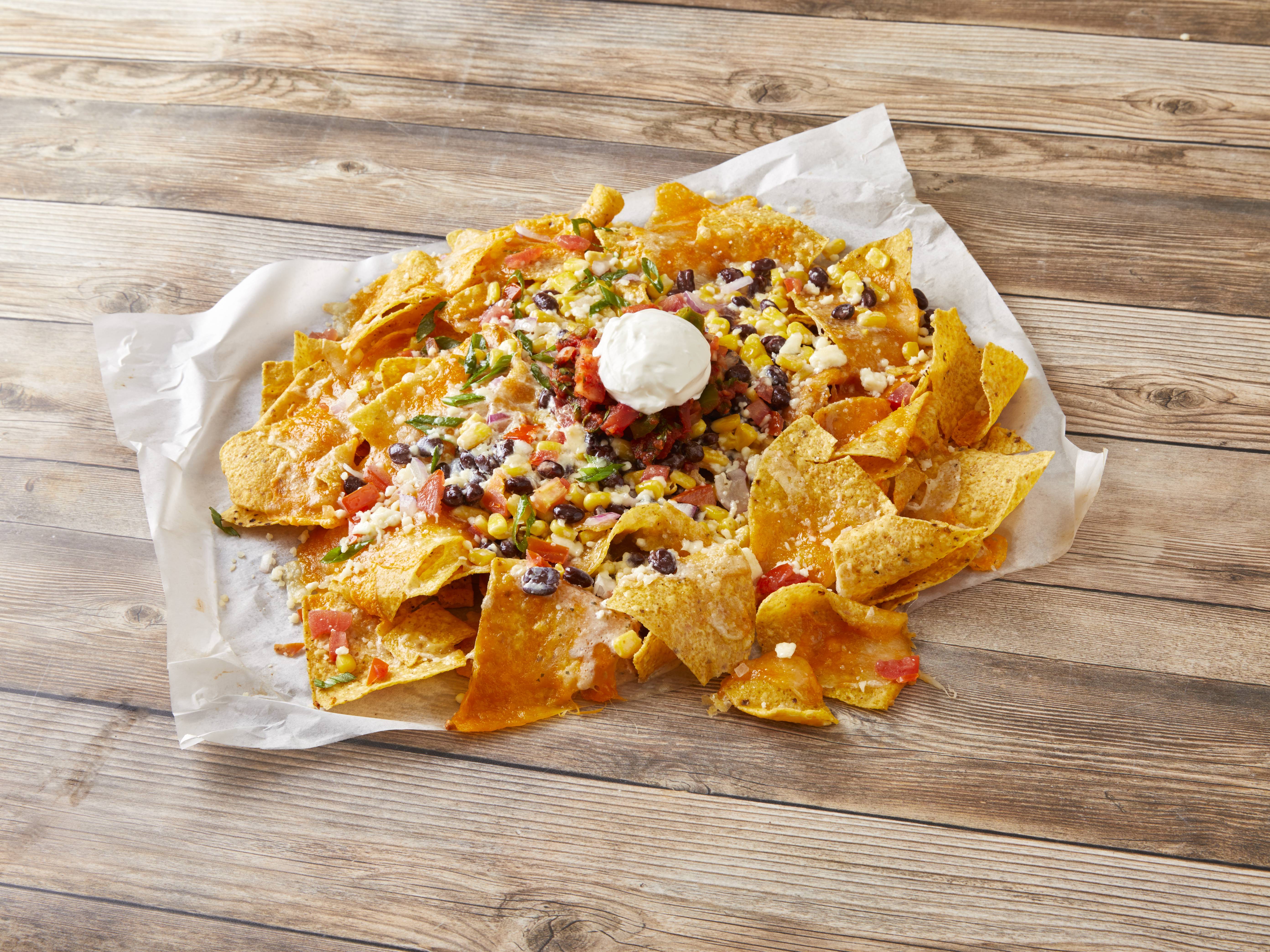 Order Mexican Street Corn Nachos food online from Centre Street Taphouse store, Portage on bringmethat.com