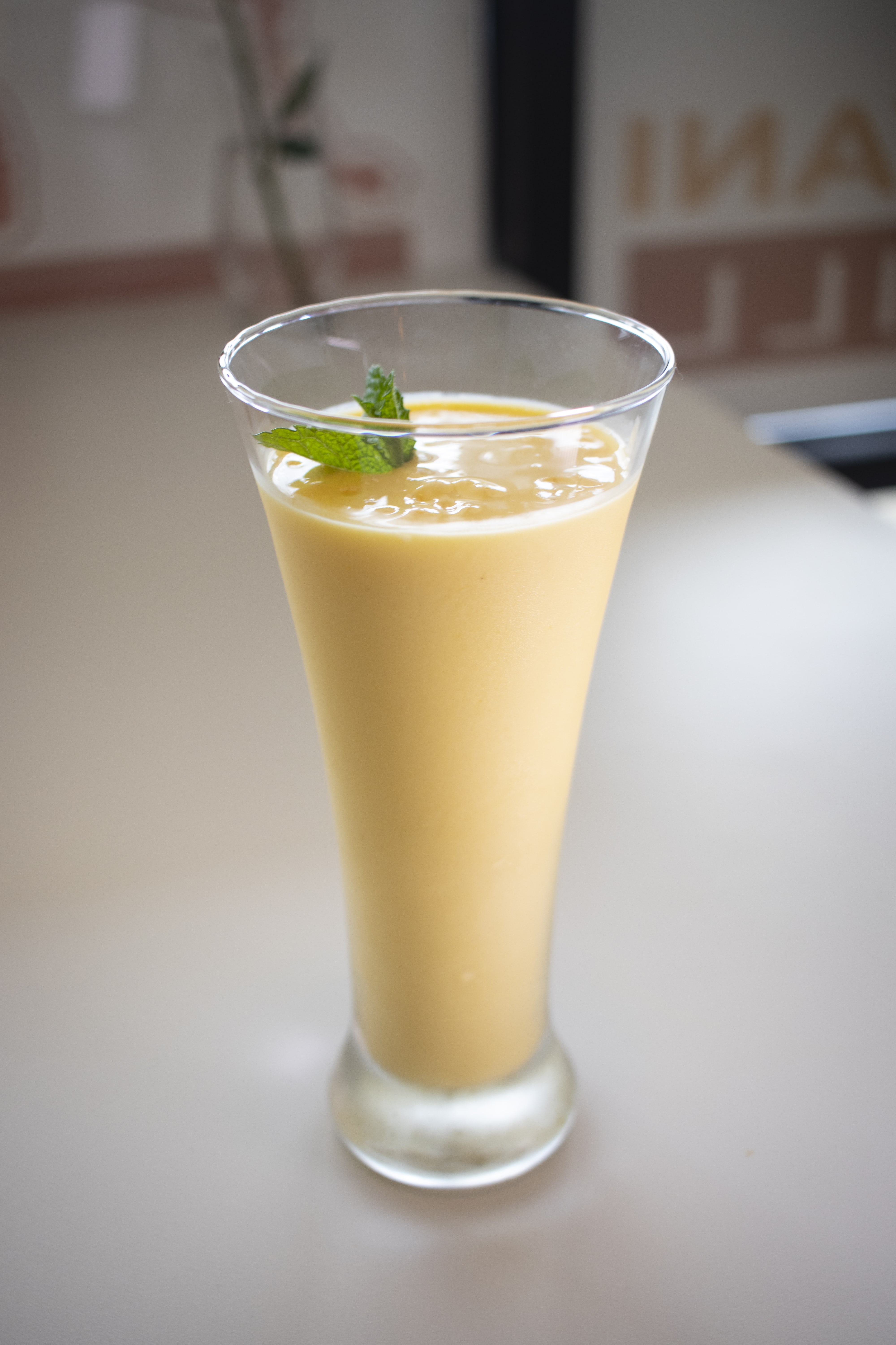 Order Mango Lassi food online from Persis Indian Grill store, Greenville on bringmethat.com