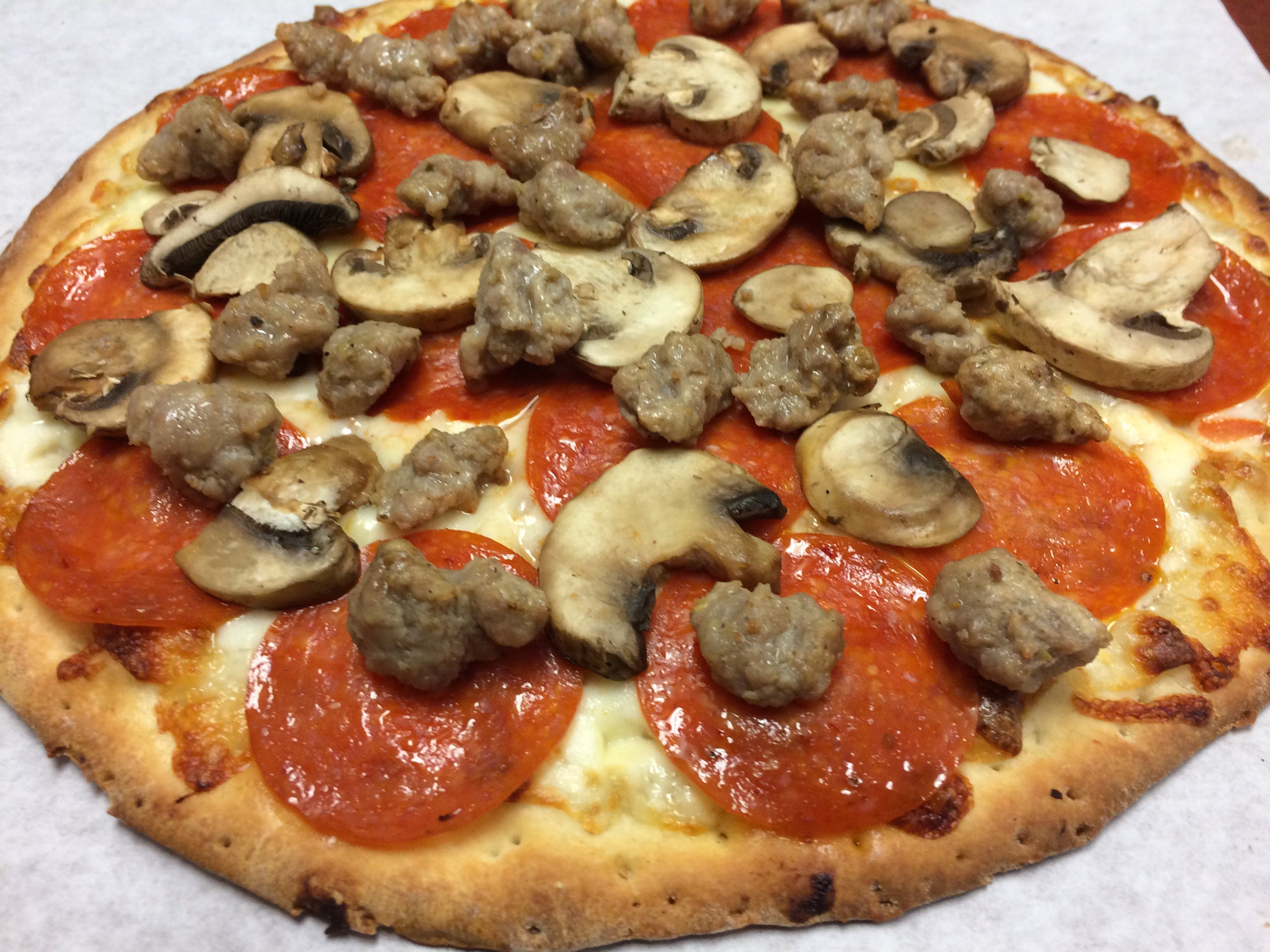 Order Pepperoni, Mushrooms & Sausage Pizza - Small food online from I pizza store, Newark on bringmethat.com