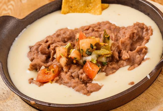 Order Bean Dip (6 oz) food online from Los Tres Amigos Mexican Restaurant store, Slidell on bringmethat.com
