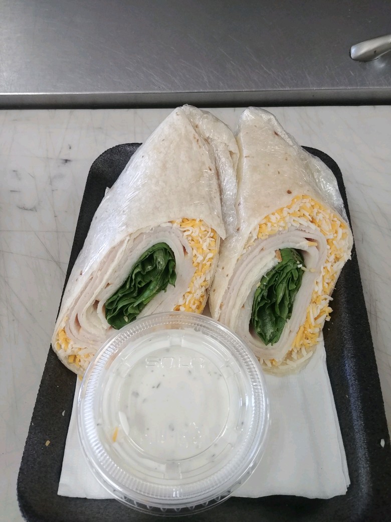 Order Turkey and shredded cheese wrap  food online from Stagecoach Liquor store, Atascadero on bringmethat.com