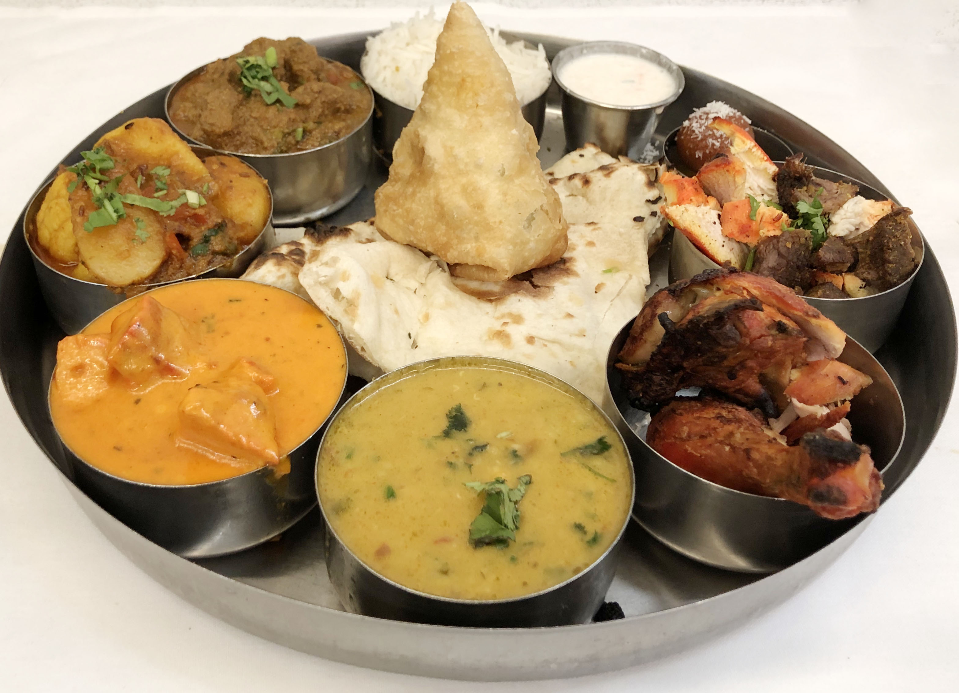 Order 1. Non-vegetarian Thali Dinner Combo for 2 food online from Himalayan Grill store, Flagstaff on bringmethat.com