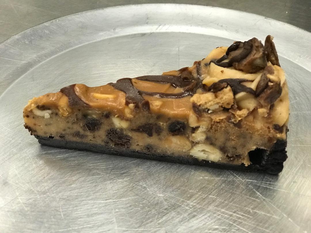Order Caramel Peanut Butter Snickers Cake food online from Ricky's New York Pizza store, Durham on bringmethat.com